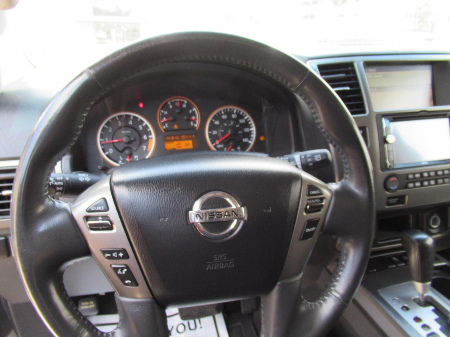 2015 Gray /Black Nissan Armada SL 2WD (5N1BA0ND4FN) with an 5.6L V8 DOHC 32V FFV engine, Automatic transmission, located at 1511 North Shepherd Dr., Houston, TX, 77008, (281) 657-1221, 29.798361, -95.412560 - 2015 NISSAN ARMADA SV-SL-PLATINUMVIN: 5N1BA0ND4FN6019714 DOOR WAGON-SPORT UTILITY5.6L V8 F DOHC 32VFLEX FUELREAR WHEEL DRIVE - Photo#9