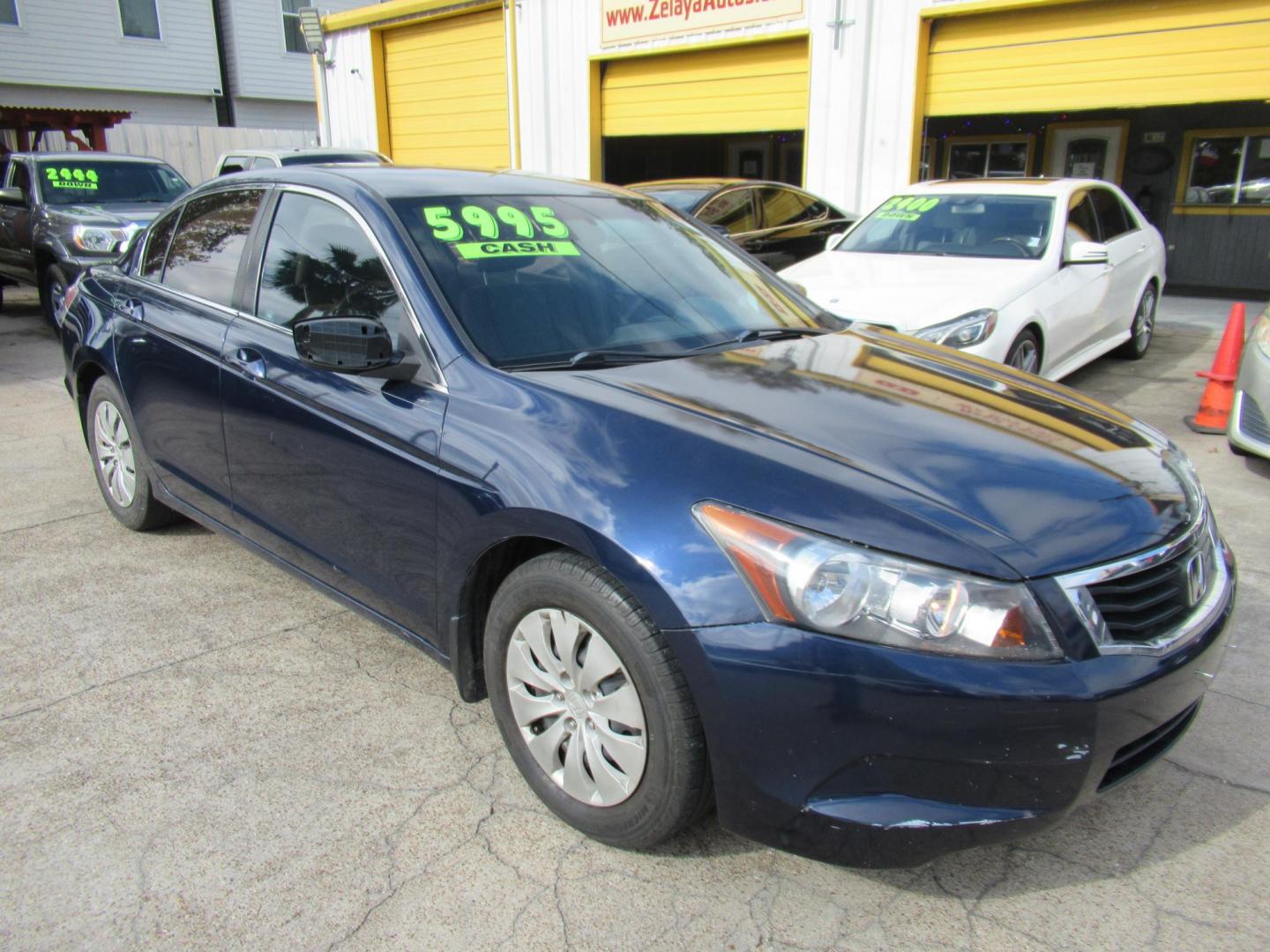 2009 Blue /Gray Honda Accord LX Sedan AT (1HGCP26339A) with an 2.4L L4 DOHC 16V engine, Automatic Overdrive transmission, located at 1511 North Shepherd Dr., Houston, TX, 77008, (281) 657-1221, 29.798361, -95.412560 - 2009 HONDA ACCORD LXVIN: 1HGCP26339A055458SEDAN 4 DR2.4L I4 F DOHC 16VGASOLINEFRONT WHEEL DRIVE - Photo#4