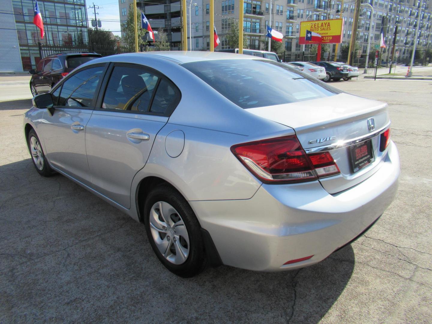 2014 Silver /Gray Honda Civic LX Sedan CVT (19XFB2F53EE) with an 1.8L L4 SOHC 16V engine, Automatic transmission, located at 1511 North Shepherd Dr., Houston, TX, 77008, (281) 657-1221, 29.798361, -95.412560 - 2014 HONDA CIVIC LXVIN: 19XFB2F53EE014802SEDAN 4 DR1.8L I4 F SOHC 16VGASOLINEFRONT WHEEL DRIVE - Photo#14