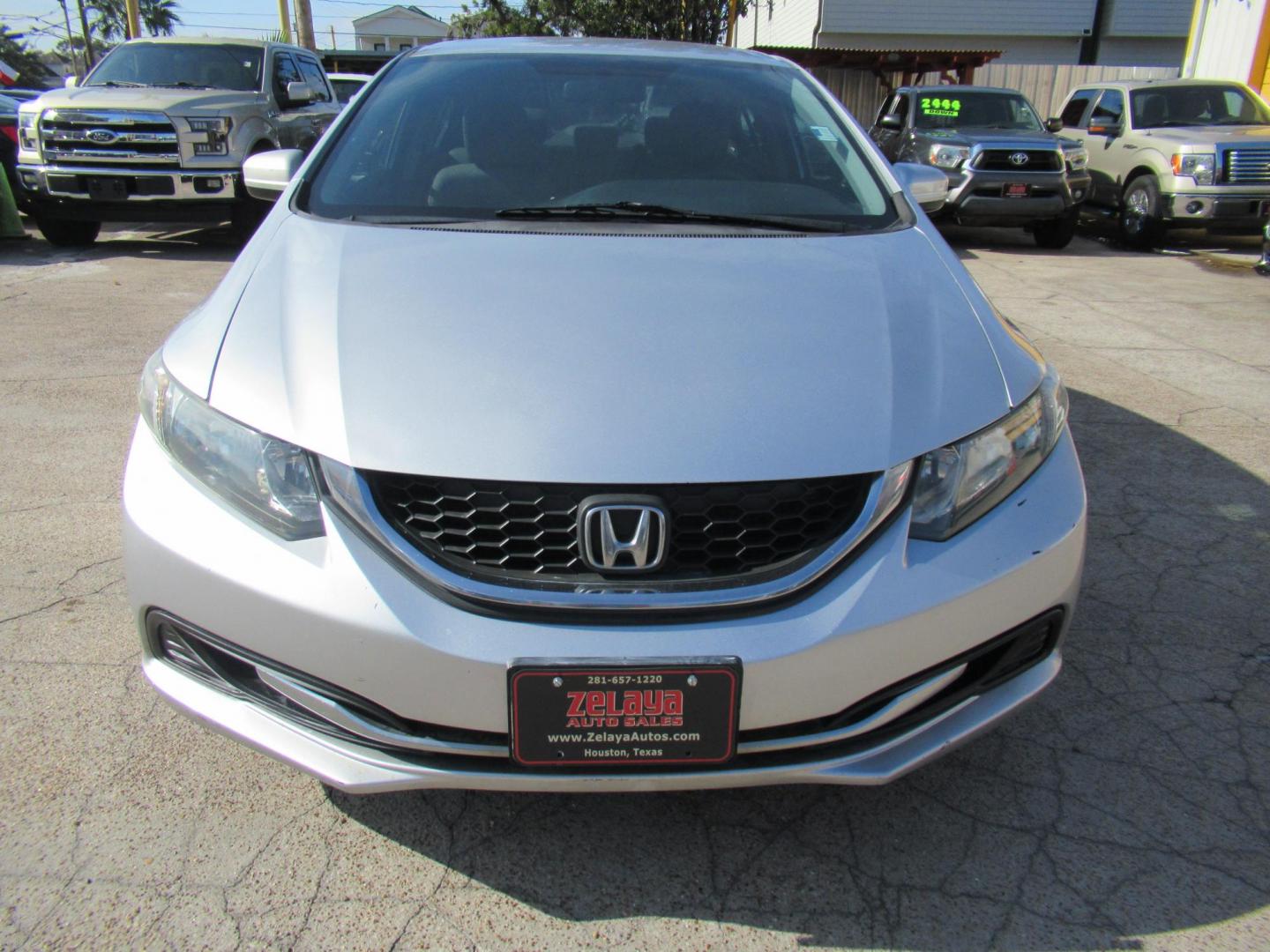 2014 Silver /Gray Honda Civic LX Sedan CVT (19XFB2F53EE) with an 1.8L L4 SOHC 16V engine, Automatic transmission, located at 1511 North Shepherd Dr., Houston, TX, 77008, (281) 657-1221, 29.798361, -95.412560 - 2014 HONDA CIVIC LXVIN: 19XFB2F53EE014802SEDAN 4 DR1.8L I4 F SOHC 16VGASOLINEFRONT WHEEL DRIVE - Photo#19