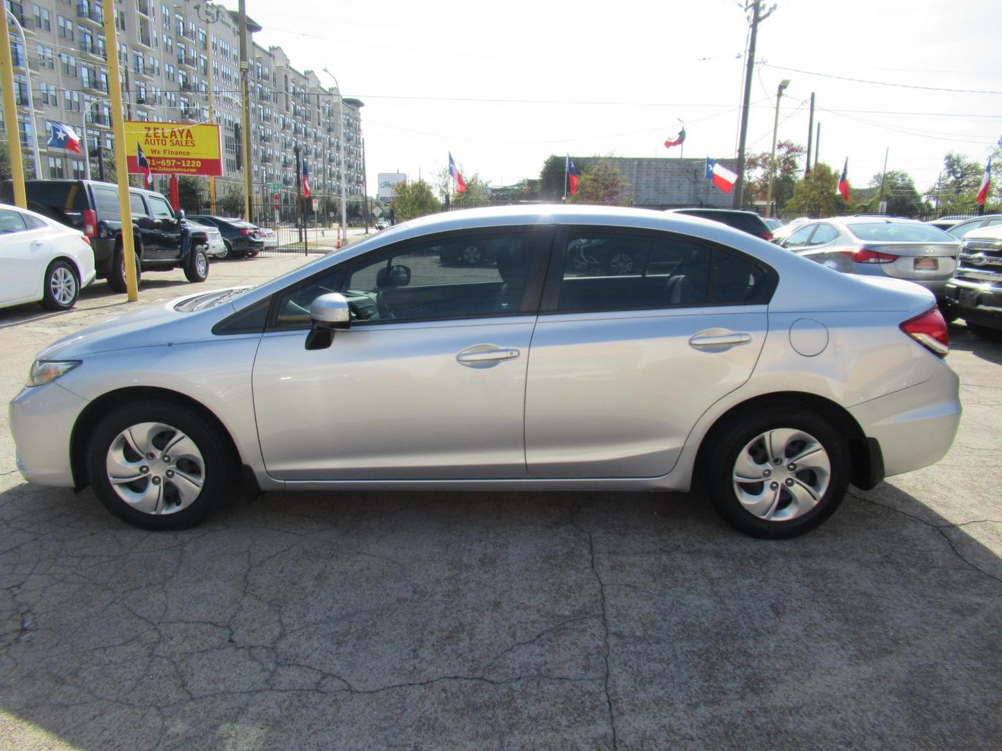 2014 Silver /Gray Honda Civic LX Sedan CVT (19XFB2F53EE) with an 1.8L L4 SOHC 16V engine, Automatic transmission, located at 1511 North Shepherd Dr., Houston, TX, 77008, (281) 657-1221, 29.798361, -95.412560 - 2014 HONDA CIVIC LXVIN: 19XFB2F53EE014802SEDAN 4 DR1.8L I4 F SOHC 16VGASOLINEFRONT WHEEL DRIVE - Photo#21