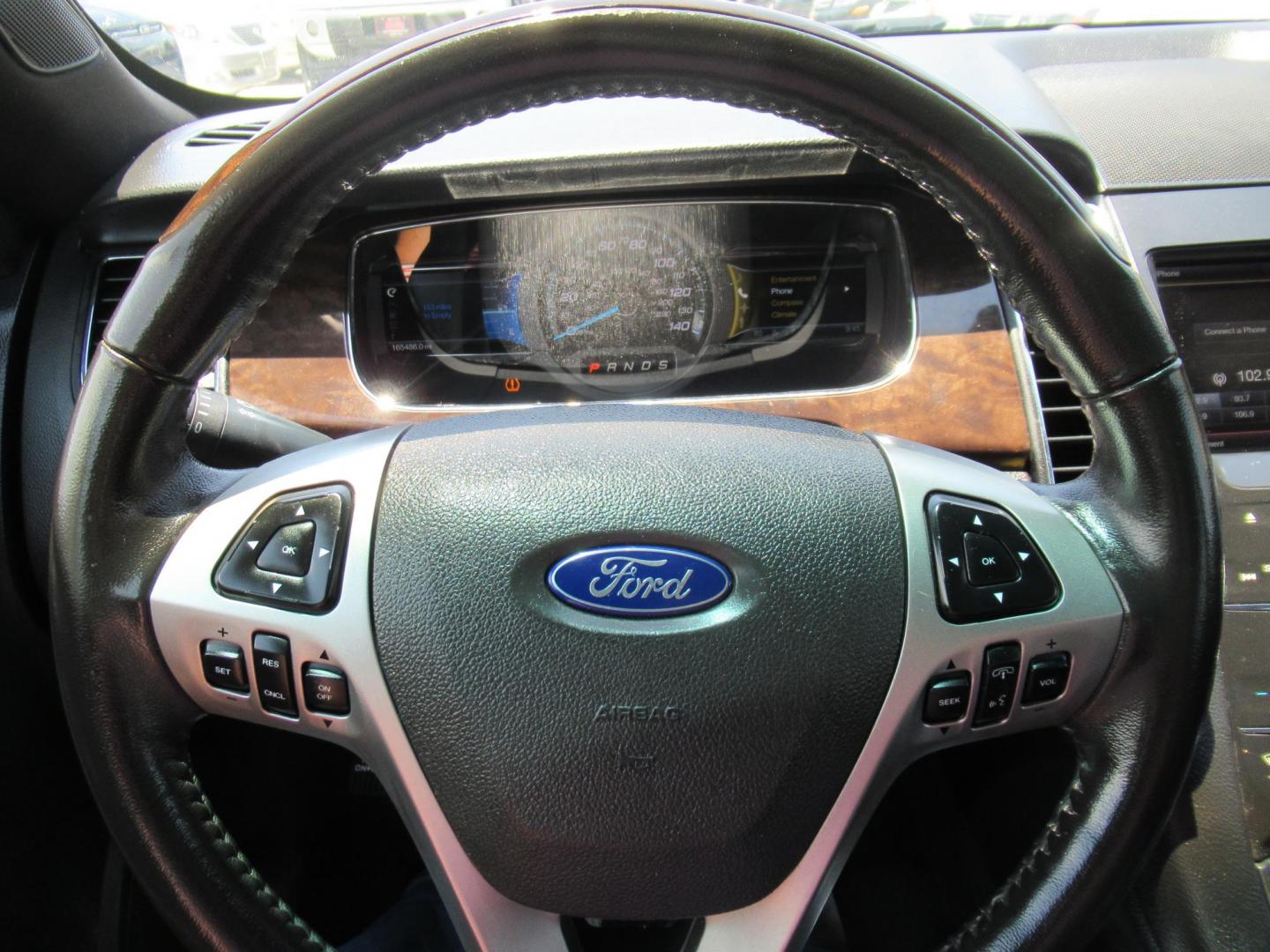 2013 Silver /Black Ford Taurus Limited FWD (1FAHP2F89DG) with an 3.5L V6 DOHC 24V engine, Automatic transmission, located at 1511 North Shepherd Dr., Houston, TX, 77008, (281) 657-1221, 29.798361, -95.412560 - 2013 FORD TAURUS LIMITED VIN: 1FAHP2F89DG103802 1 F A H P 2 F 8 9 D G 1 0 3 8 0 2 SEDAN 4 DR 3.5L V6 F DOHC 24V GASOLINE FRONT WHEEL DRIVE - Photo#1