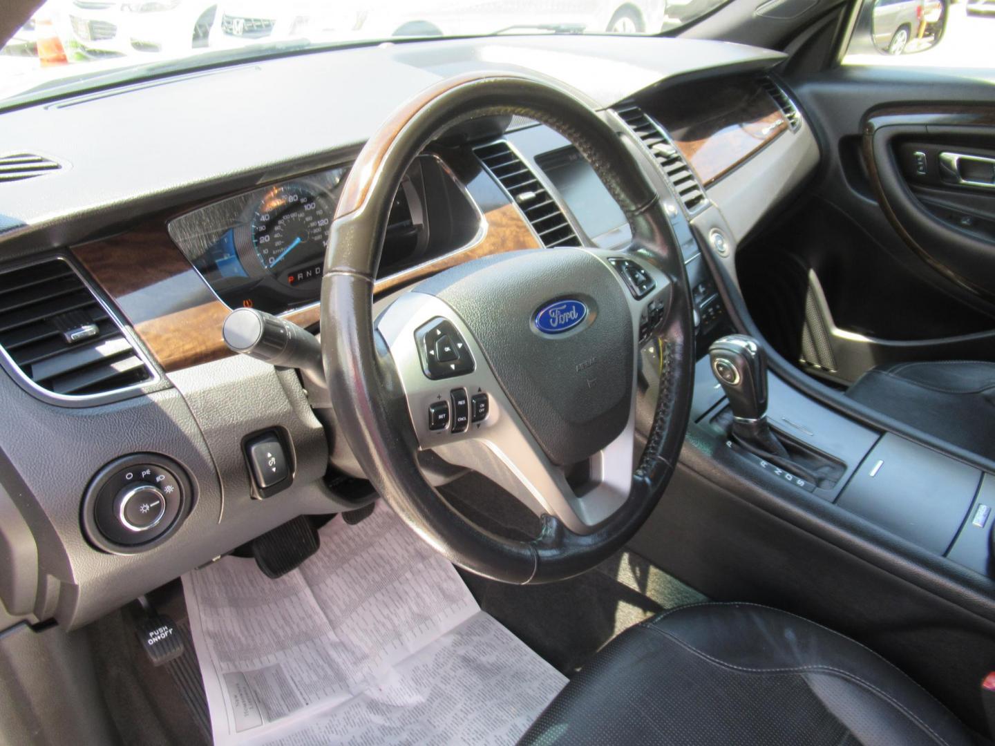 2013 Silver /Black Ford Taurus Limited FWD (1FAHP2F89DG) with an 3.5L V6 DOHC 24V engine, Automatic transmission, located at 1511 North Shepherd Dr., Houston, TX, 77008, (281) 657-1221, 29.798361, -95.412560 - 2013 FORD TAURUS LIMITED VIN: 1FAHP2F89DG103802 1 F A H P 2 F 8 9 D G 1 0 3 8 0 2 SEDAN 4 DR 3.5L V6 F DOHC 24V GASOLINE FRONT WHEEL DRIVE - Photo#4