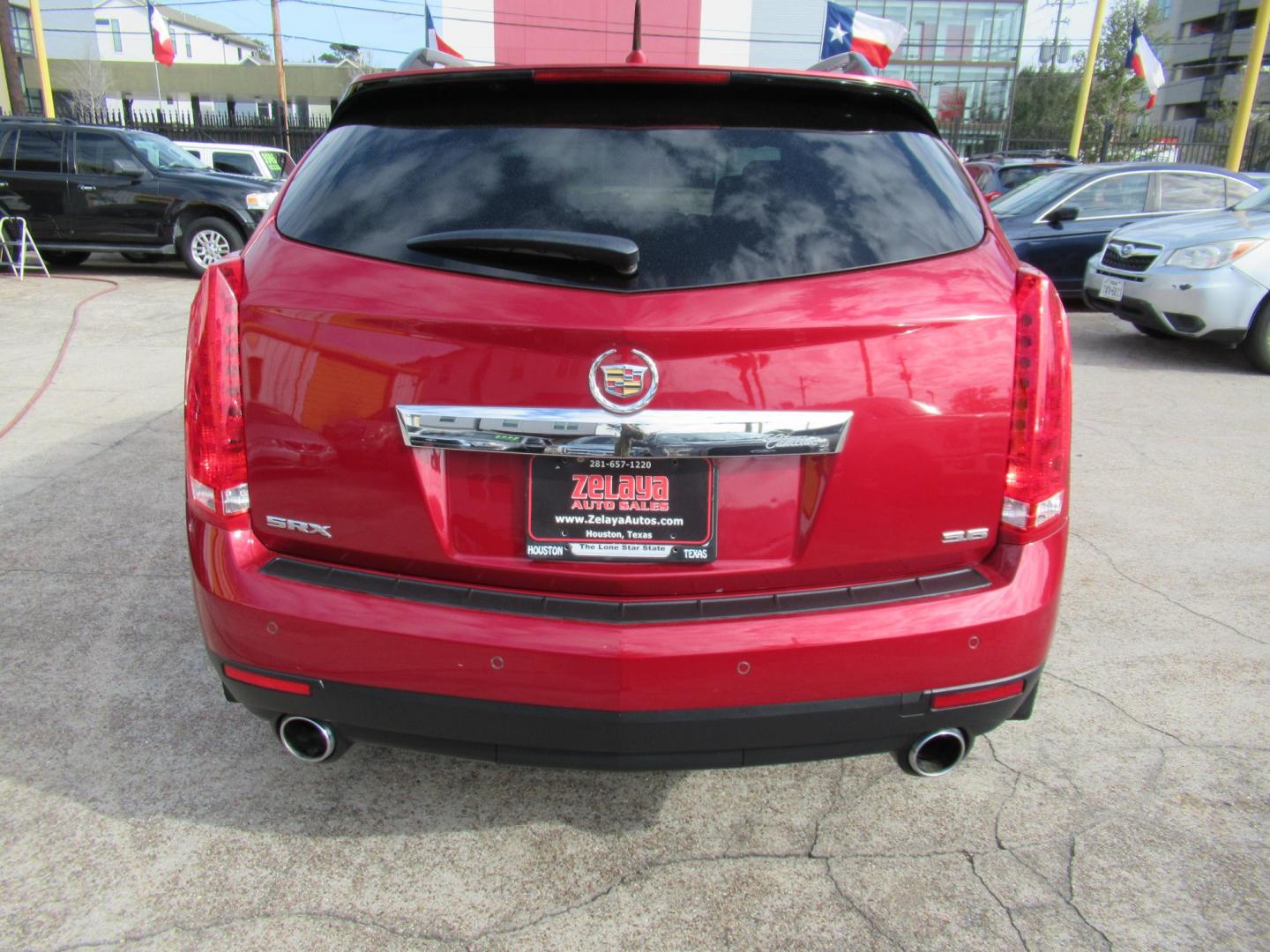 2014 Red /Tan Cadillac SRX Premium Collection FWD (3GYFNDE33ES) with an 3.6L V6 DOHC 24V FFV engine, Automatic transmission, located at 1511 North Shepherd Dr., Houston, TX, 77008, (281) 657-1221, 29.798361, -95.412560 - 2014 CADILLAC SRX PREMIUM COLLECTION VIN: 3GYFNDE33ES567934 3 G Y F N D E 3 3 E S 5 6 7 9 3 4 4 DOOR WAGON/SPORT UTILITY 3.6L V6 F DOHC 24V GASOLINE FRONT WHEEL DRIVE - Photo#17