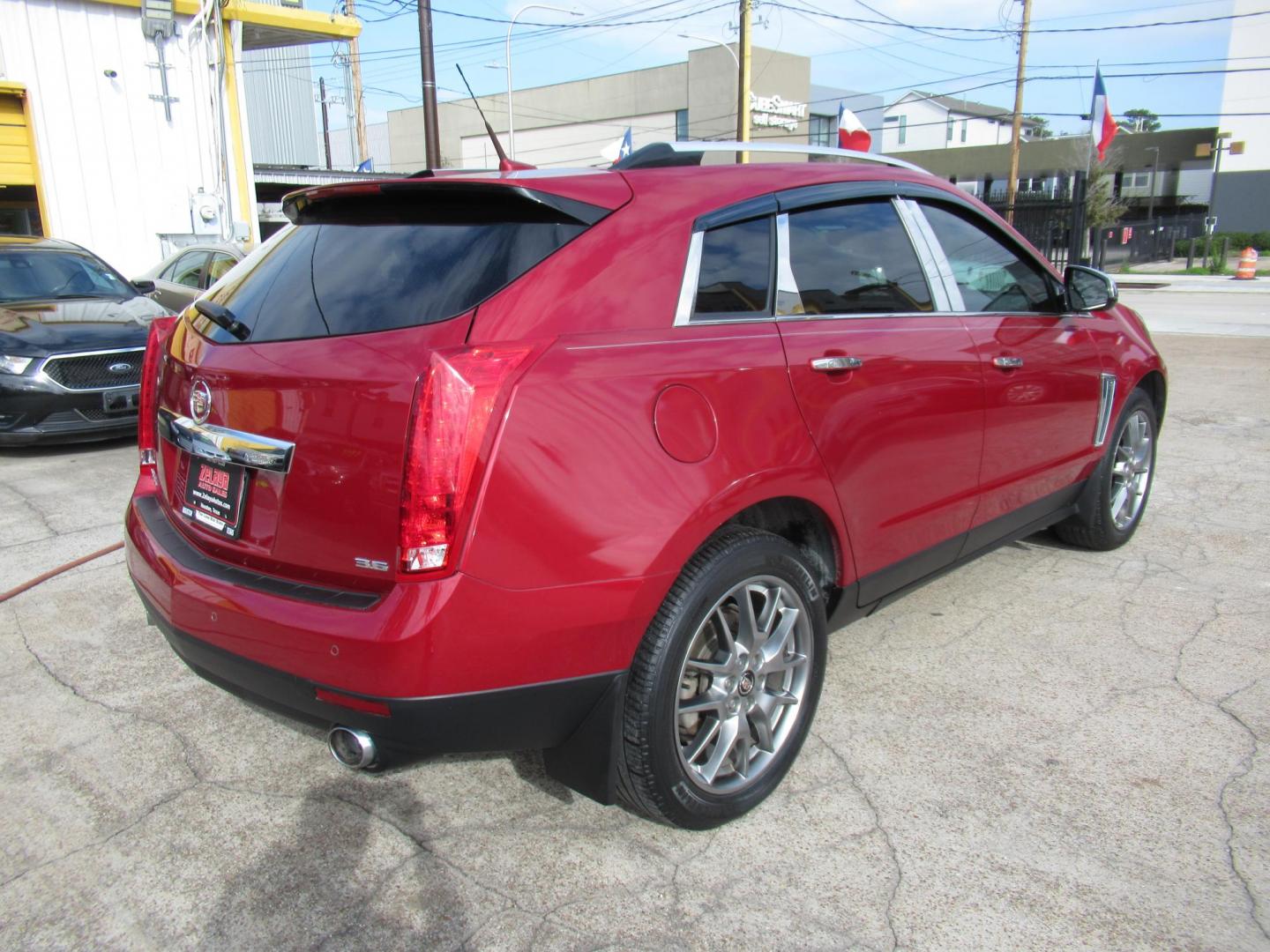 2014 Red /Tan Cadillac SRX Premium Collection FWD (3GYFNDE33ES) with an 3.6L V6 DOHC 24V FFV engine, Automatic transmission, located at 1511 North Shepherd Dr., Houston, TX, 77008, (281) 657-1221, 29.798361, -95.412560 - 2014 CADILLAC SRX PREMIUM COLLECTION VIN: 3GYFNDE33ES567934 3 G Y F N D E 3 3 E S 5 6 7 9 3 4 4 DOOR WAGON/SPORT UTILITY 3.6L V6 F DOHC 24V GASOLINE FRONT WHEEL DRIVE - Photo#18