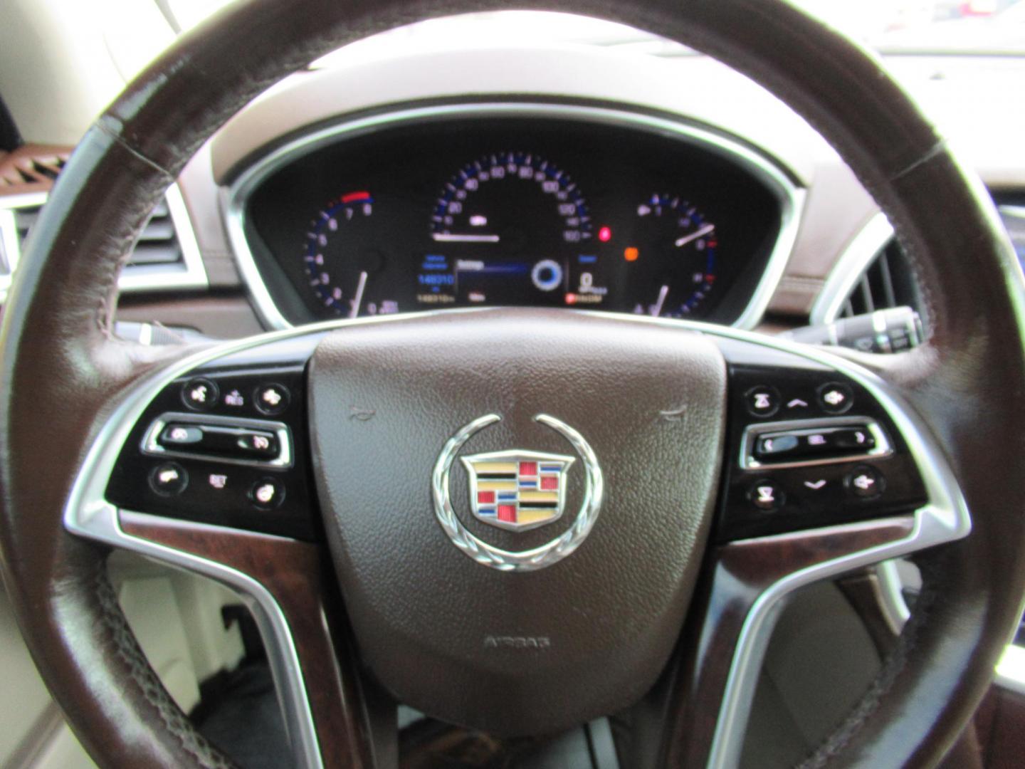 2014 Red /Tan Cadillac SRX Premium Collection FWD (3GYFNDE33ES) with an 3.6L V6 DOHC 24V FFV engine, Automatic transmission, located at 1511 North Shepherd Dr., Houston, TX, 77008, (281) 657-1221, 29.798361, -95.412560 - 2014 CADILLAC SRX PREMIUM COLLECTION VIN: 3GYFNDE33ES567934 3 G Y F N D E 3 3 E S 5 6 7 9 3 4 4 DOOR WAGON/SPORT UTILITY 3.6L V6 F DOHC 24V GASOLINE FRONT WHEEL DRIVE - Photo#2