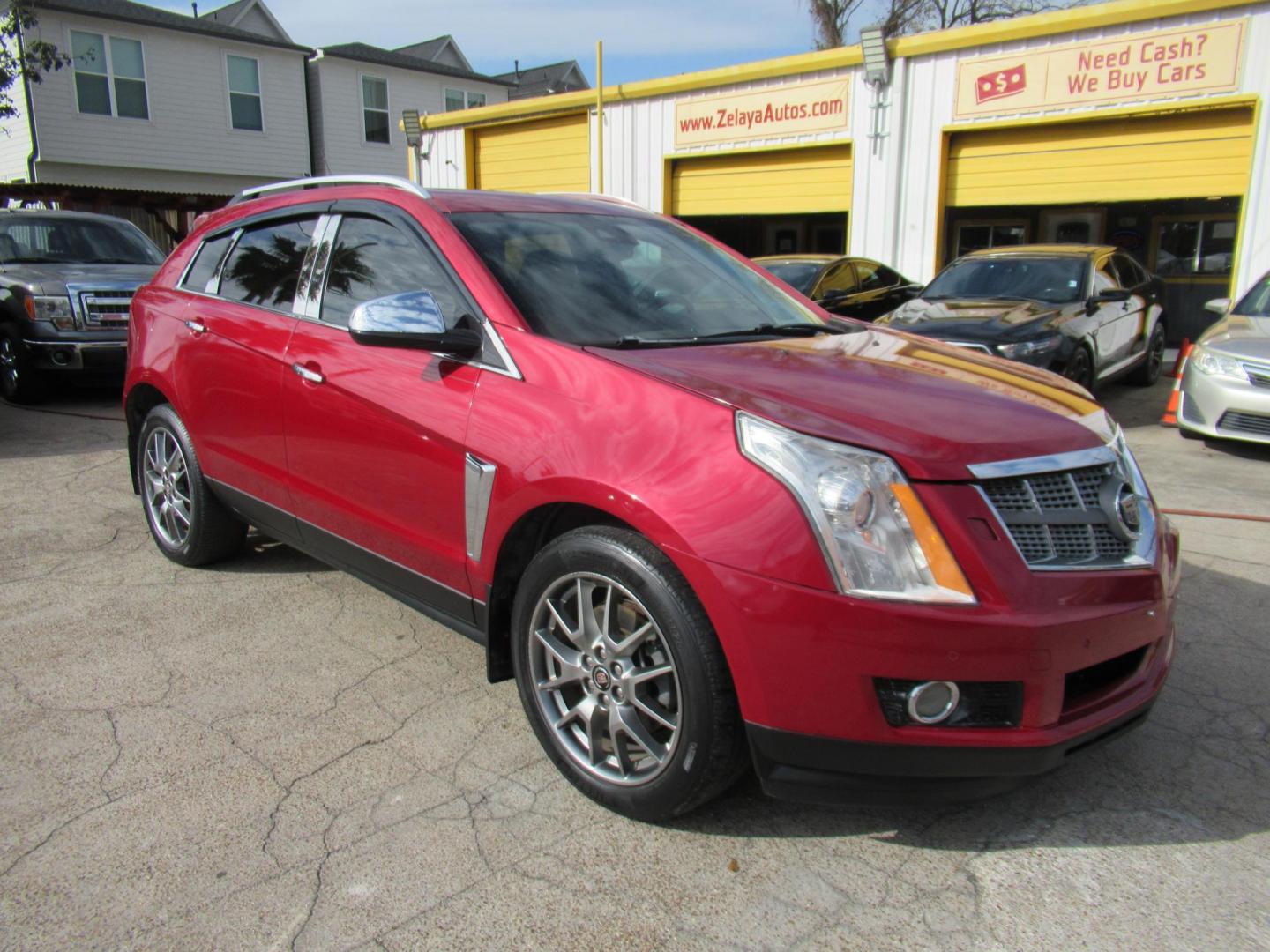 2014 Red /Tan Cadillac SRX Premium Collection FWD (3GYFNDE33ES) with an 3.6L V6 DOHC 24V FFV engine, Automatic transmission, located at 1511 North Shepherd Dr., Houston, TX, 77008, (281) 657-1221, 29.798361, -95.412560 - 2014 CADILLAC SRX PREMIUM COLLECTION VIN: 3GYFNDE33ES567934 3 G Y F N D E 3 3 E S 5 6 7 9 3 4 4 DOOR WAGON/SPORT UTILITY 3.6L V6 F DOHC 24V GASOLINE FRONT WHEEL DRIVE - Photo#20