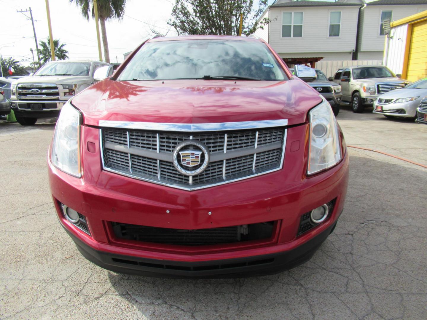 2014 Red /Tan Cadillac SRX Premium Collection FWD (3GYFNDE33ES) with an 3.6L V6 DOHC 24V FFV engine, Automatic transmission, located at 1511 North Shepherd Dr., Houston, TX, 77008, (281) 657-1221, 29.798361, -95.412560 - 2014 CADILLAC SRX PREMIUM COLLECTION VIN: 3GYFNDE33ES567934 3 G Y F N D E 3 3 E S 5 6 7 9 3 4 4 DOOR WAGON/SPORT UTILITY 3.6L V6 F DOHC 24V GASOLINE FRONT WHEEL DRIVE - Photo#21