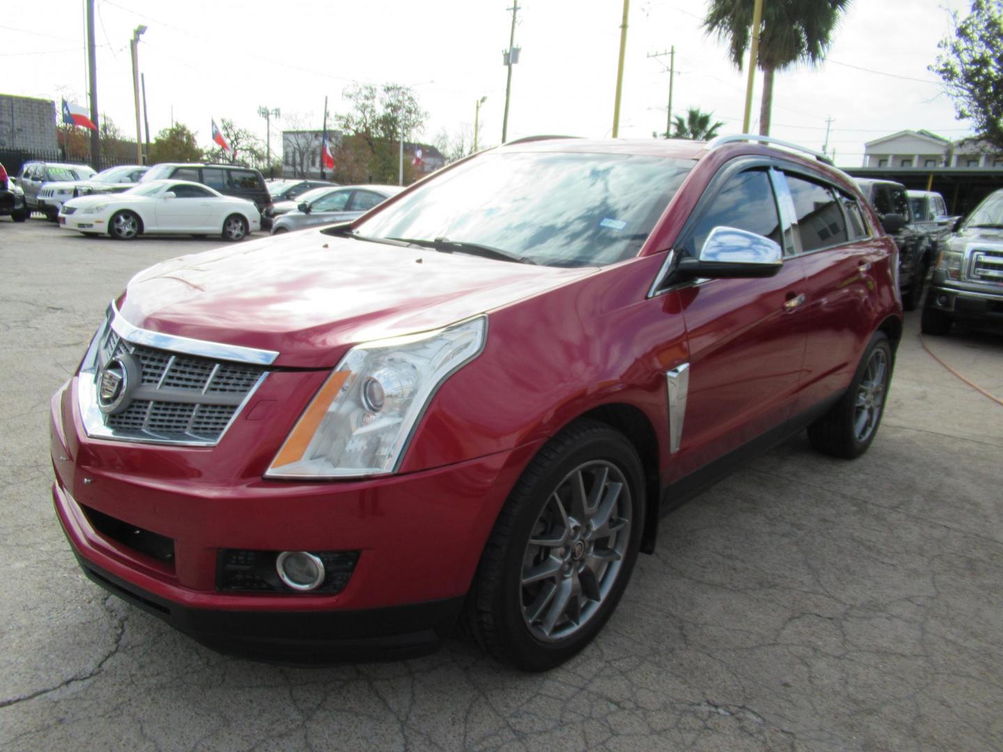 2014 Red /Tan Cadillac SRX Premium Collection FWD (3GYFNDE33ES) with an 3.6L V6 DOHC 24V FFV engine, Automatic transmission, located at 1511 North Shepherd Dr., Houston, TX, 77008, (281) 657-1221, 29.798361, -95.412560 - 2014 CADILLAC SRX PREMIUM COLLECTION VIN: 3GYFNDE33ES567934 3 G Y F N D E 3 3 E S 5 6 7 9 3 4 4 DOOR WAGON/SPORT UTILITY 3.6L V6 F DOHC 24V GASOLINE FRONT WHEEL DRIVE - Photo#22