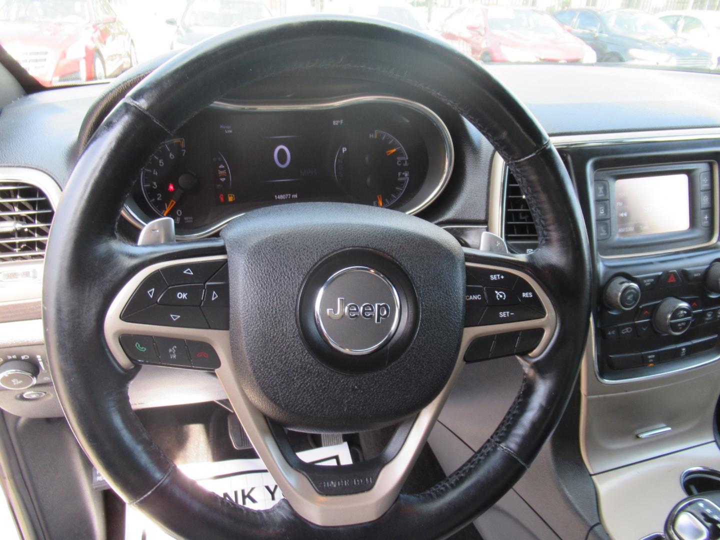 2014 White /Tan Jeep Grand Cherokee Laredo 2WD (1C4RJEAG8EC) with an 3.6L V6 DOHC 24V engine, Automatic transmission, located at 1511 North Shepherd Dr., Houston, TX, 77008, (281) 657-1221, 29.798361, -95.412560 - Photo#2