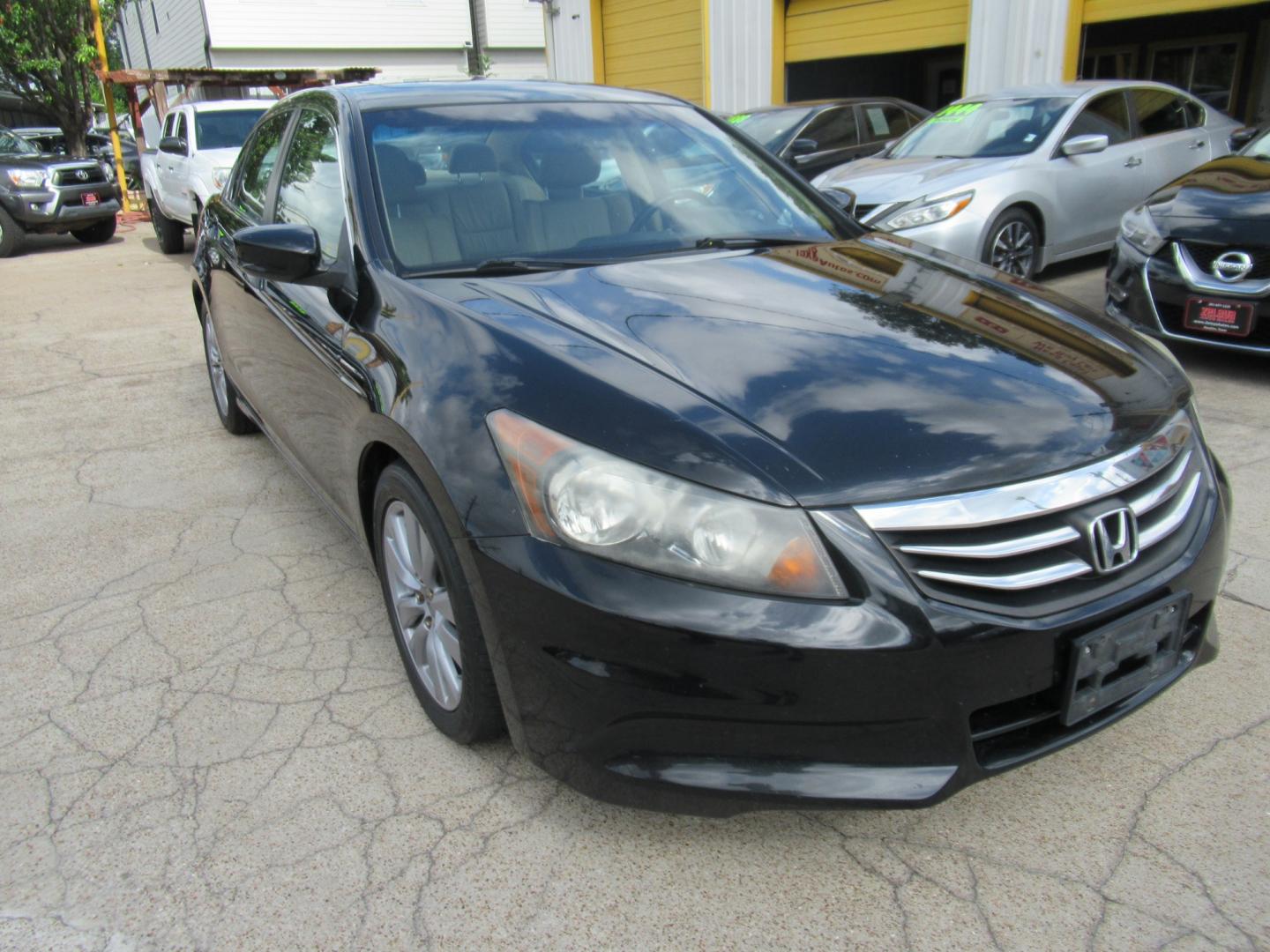 2011 Black /Tan Honda Accord EX-L Sedan AT (1HGCP2F8XBA) with an 2.4L L4 DOHC 16V engine, Automatic transmission, located at 1511 North Shepherd Dr., Houston, TX, 77008, (281) 657-1221, 29.798361, -95.412560 - Photo#9