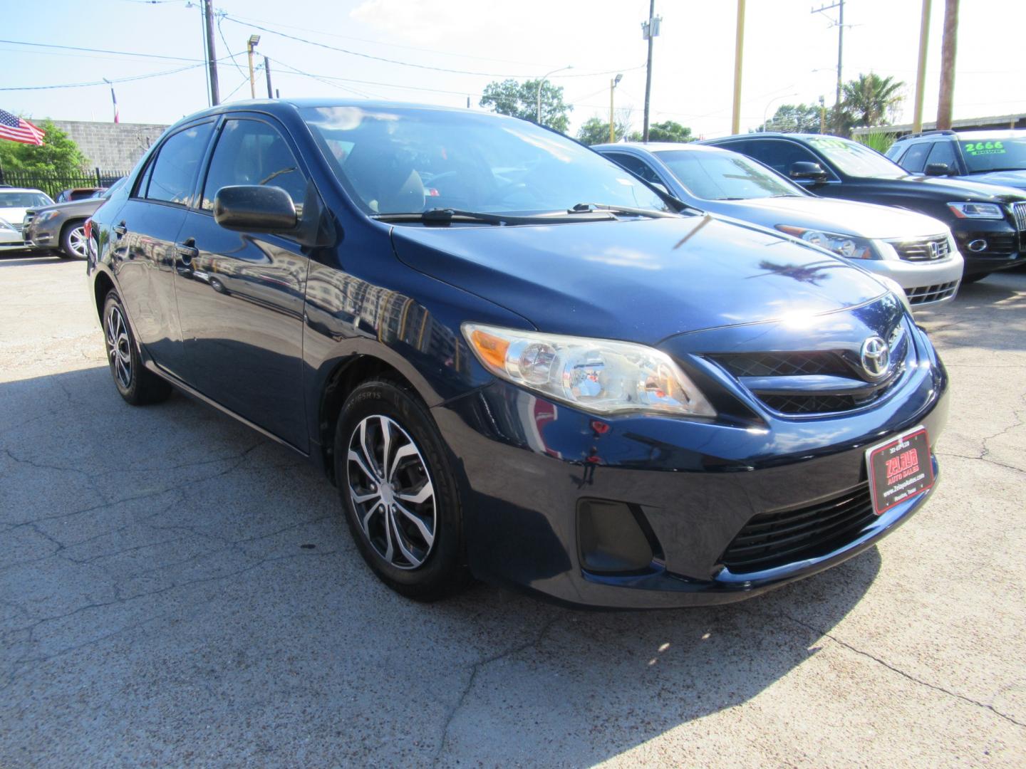 2012 Blue /Tan Toyota Corolla LE 4-Speed AT (5YFBU4EE8CP) with an 1.8L L4 DOHC 16V engine, Automatic transmission, located at 1511 North Shepherd Dr., Houston, TX, 77008, (281) 657-1221, 29.798361, -95.412560 - Photo#6