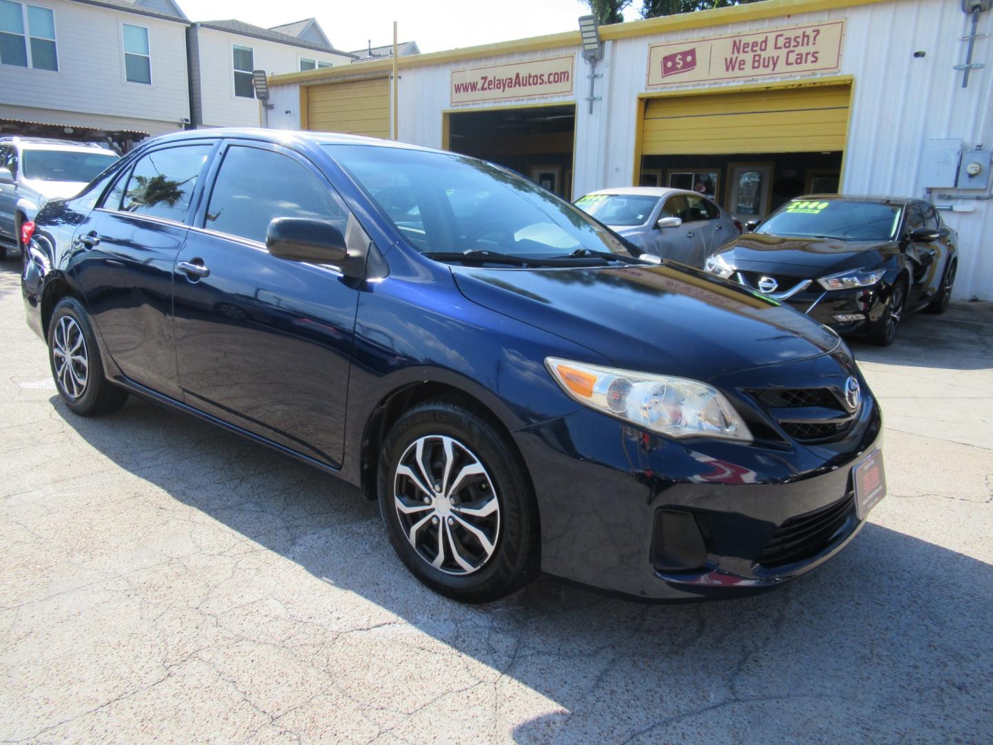 2012 Blue /Tan Toyota Corolla LE 4-Speed AT (5YFBU4EE8CP) with an 1.8L L4 DOHC 16V engine, Automatic transmission, located at 1511 North Shepherd Dr., Houston, TX, 77008, (281) 657-1221, 29.798361, -95.412560 - Photo#9