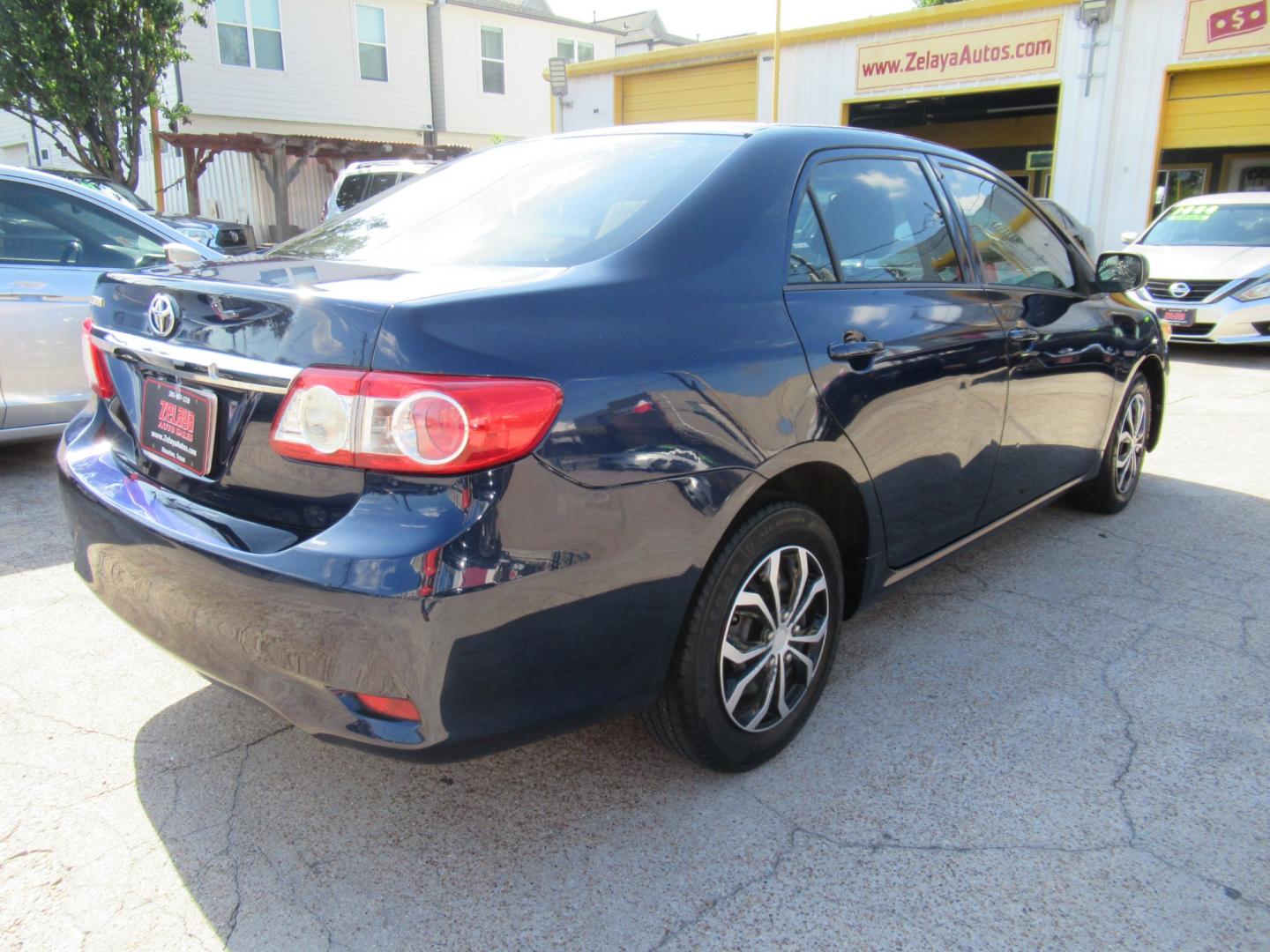 2012 Blue /Tan Toyota Corolla LE 4-Speed AT (5YFBU4EE8CP) with an 1.8L L4 DOHC 16V engine, Automatic transmission, located at 1511 North Shepherd Dr., Houston, TX, 77008, (281) 657-1221, 29.798361, -95.412560 - Photo#4