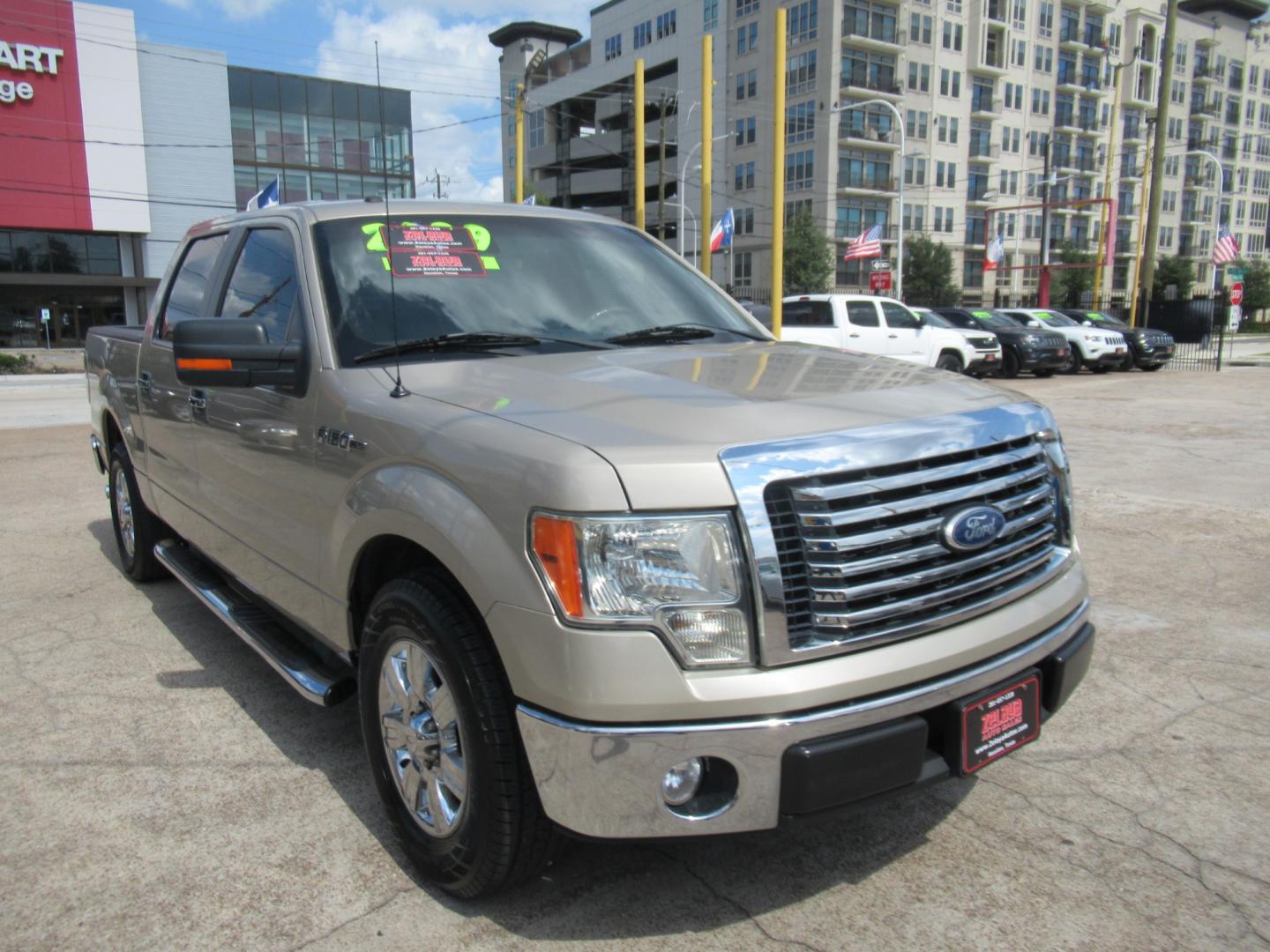 2010 /Tan Ford F-150 Lariat SuperCrew 5.5-ft. Bed 2WD (1FTEW1C84AF) with an 4.6L V8 SOHC 24V engine, Automatic transmission, located at 1511 North Shepherd Dr., Houston, TX, 77008, (281) 657-1221, 29.798361, -95.412560 - Photo#17