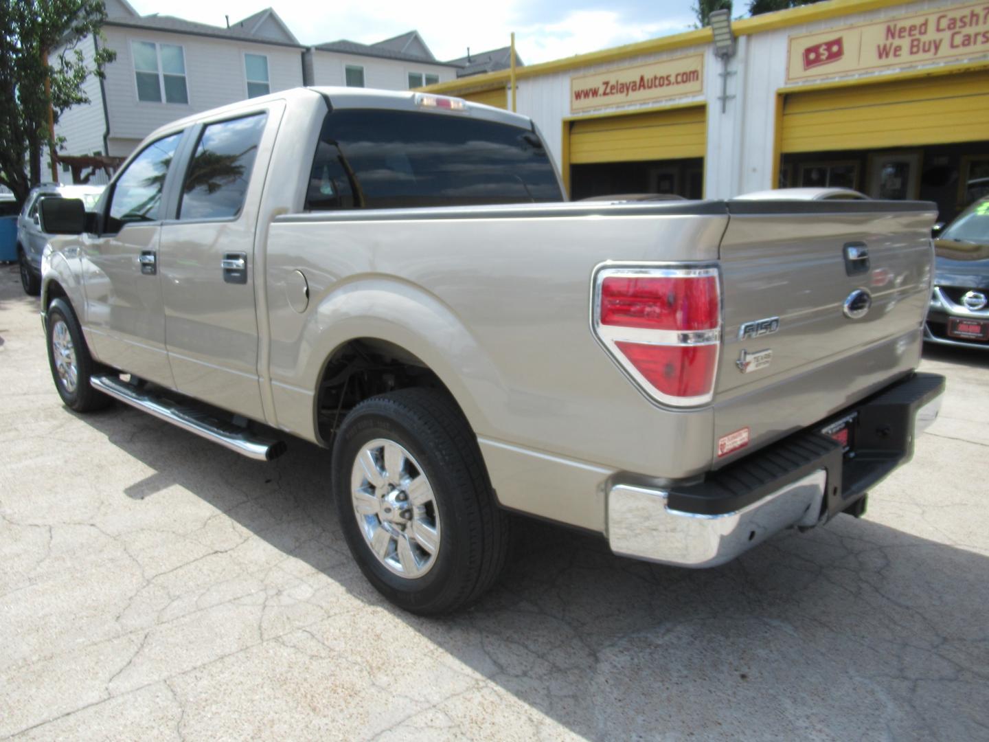 2010 /Tan Ford F-150 Lariat SuperCrew 5.5-ft. Bed 2WD (1FTEW1C84AF) with an 4.6L V8 SOHC 24V engine, Automatic transmission, located at 1511 North Shepherd Dr., Houston, TX, 77008, (281) 657-1221, 29.798361, -95.412560 - Photo#20