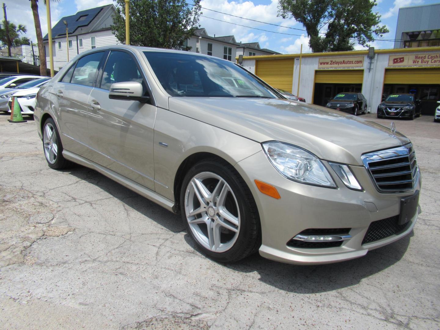 2012 /Tan Mercedes-Benz E-Class E350 Sedan (WDDHF5KB5CA) with an 3.5L V6 DOHC 24V engine, Automatic transmission, located at 1511 North Shepherd Dr., Houston, TX, 77008, (281) 657-1221, 29.798361, -95.412560 - Mercedes-Benz E-Class E350 Sedan SEDAN 4-DR 3.5L V6 DOHC 24V V6 Automatic RWD - Photo#18