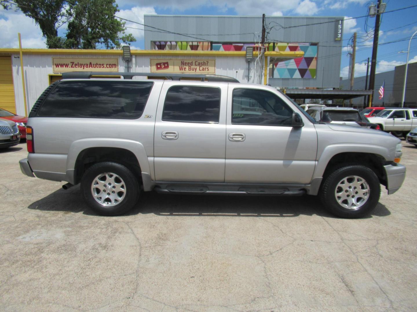 2004 /Gray Chevrolet Suburban 1500 4WD (3GNFK16Z44G) with an 5.3L V8 OHV 16V FFV engine, Automatic Overdrive transmission, located at 1511 North Shepherd Dr., Houston, TX, 77008, (281) 657-1221, 29.798361, -95.412560 - Chevrolet Suburban 1500 4WD SUV 4-DR 5.3L V8 OHV 16V FFV V8 Automatic 4WD - Photo#0