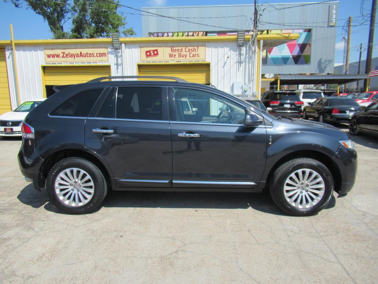 2015 Black /Tan Lincoln MKX FWD (2LMDJ6JK1FB) with an 3.7L V6 DOHC 24V engine, Automatic transmission, located at 1511 North Shepherd Dr., Houston, TX, 77008, (281) 657-1221, 29.798361, -95.412560 - 2015 Lincoln MKX FWD SUV 4-DR 3.7L V6 DOHC 24V V6 - Photo#0