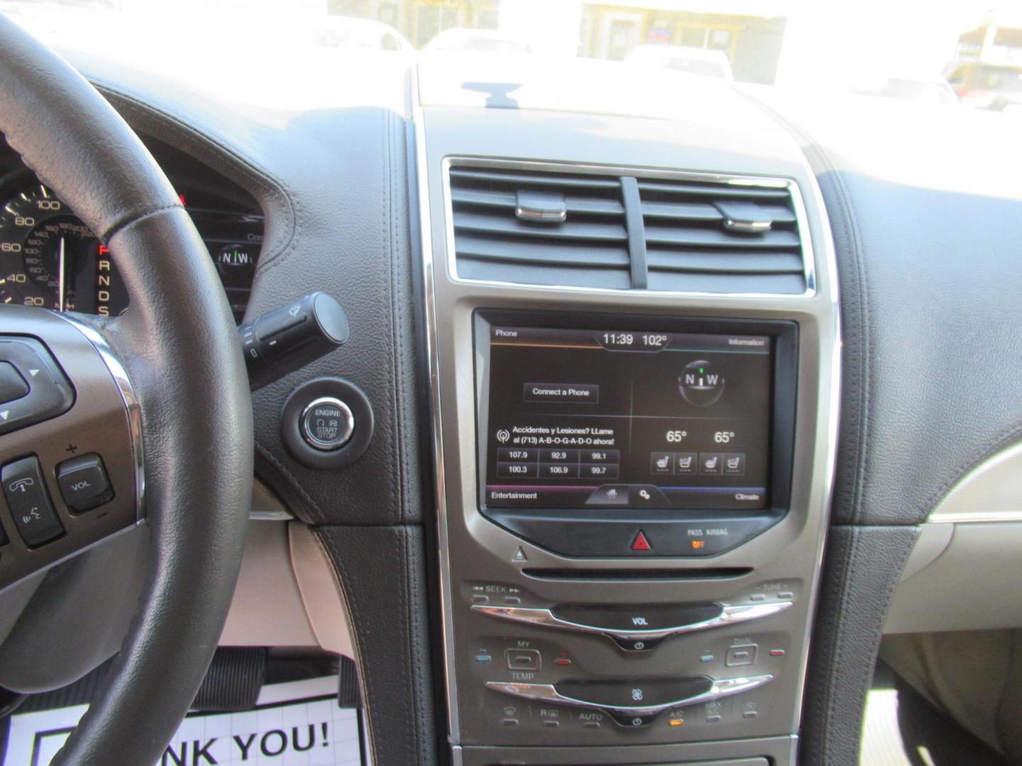 2015 Black /Tan Lincoln MKX FWD (2LMDJ6JK1FB) with an 3.7L V6 DOHC 24V engine, Automatic transmission, located at 1511 North Shepherd Dr., Houston, TX, 77008, (281) 657-1221, 29.798361, -95.412560 - 2015 Lincoln MKX FWD SUV 4-DR 3.7L V6 DOHC 24V V6 - Photo#1