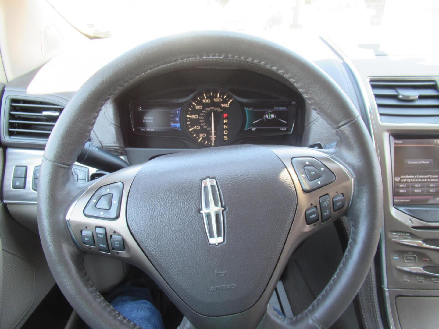 2015 Black /Tan Lincoln MKX FWD (2LMDJ6JK1FB) with an 3.7L V6 DOHC 24V engine, Automatic transmission, located at 1511 North Shepherd Dr., Houston, TX, 77008, (281) 657-1221, 29.798361, -95.412560 - 2015 Lincoln MKX FWD SUV 4-DR 3.7L V6 DOHC 24V V6 - Photo#18