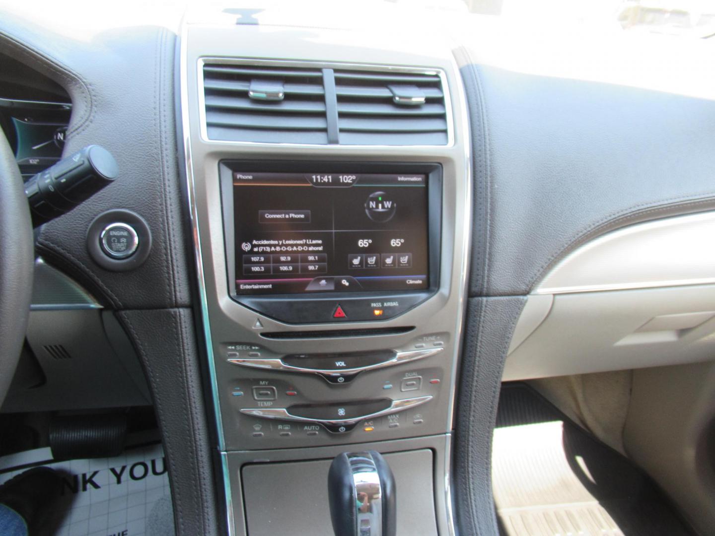 2015 Black /Tan Lincoln MKX FWD (2LMDJ6JK1FB) with an 3.7L V6 DOHC 24V engine, Automatic transmission, located at 1511 North Shepherd Dr., Houston, TX, 77008, (281) 657-1221, 29.798361, -95.412560 - 2015 Lincoln MKX FWD SUV 4-DR 3.7L V6 DOHC 24V V6 - Photo#19