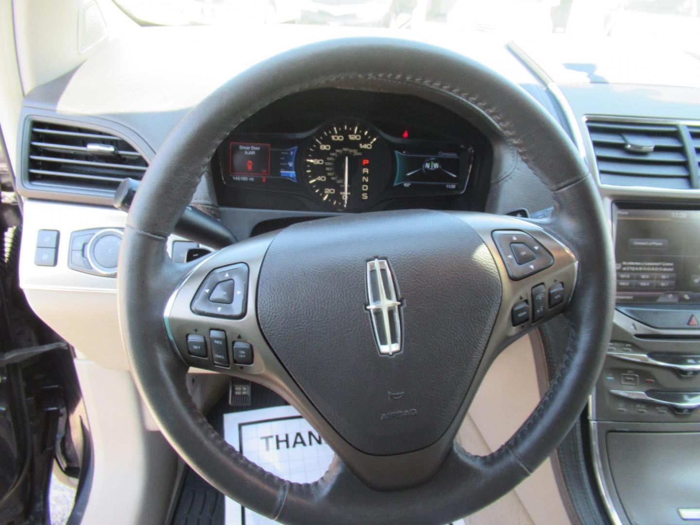 2015 Black /Tan Lincoln MKX FWD (2LMDJ6JK1FB) with an 3.7L V6 DOHC 24V engine, Automatic transmission, located at 1511 North Shepherd Dr., Houston, TX, 77008, (281) 657-1221, 29.798361, -95.412560 - 2015 Lincoln MKX FWD SUV 4-DR 3.7L V6 DOHC 24V V6 - Photo#2