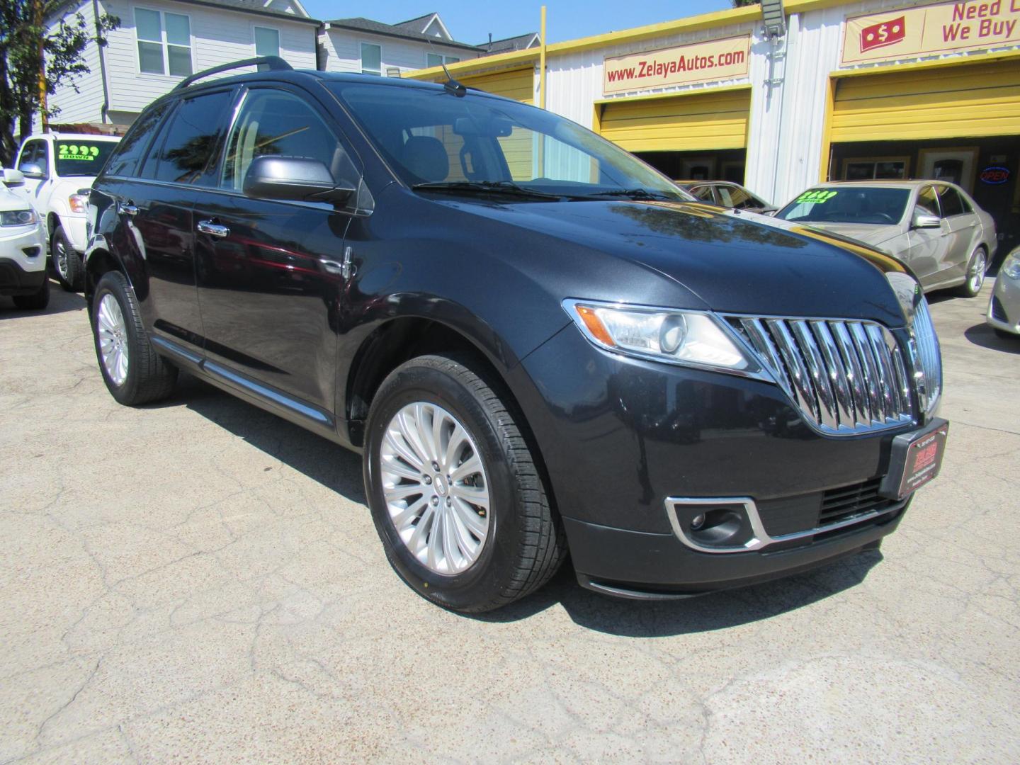 2015 Black /Tan Lincoln MKX FWD (2LMDJ6JK1FB) with an 3.7L V6 DOHC 24V engine, Automatic transmission, located at 1511 North Shepherd Dr., Houston, TX, 77008, (281) 657-1221, 29.798361, -95.412560 - 2015 Lincoln MKX FWD SUV 4-DR 3.7L V6 DOHC 24V V6 - Photo#24