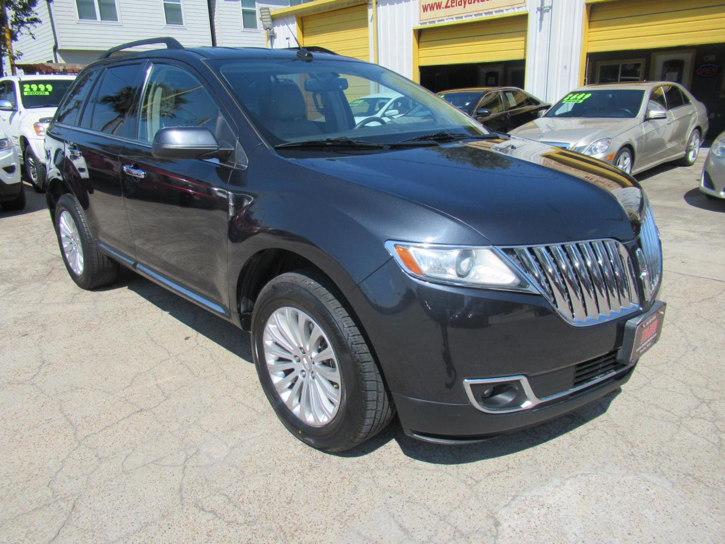 2015 Black /Tan Lincoln MKX FWD (2LMDJ6JK1FB) with an 3.7L V6 DOHC 24V engine, Automatic transmission, located at 1511 North Shepherd Dr., Houston, TX, 77008, (281) 657-1221, 29.798361, -95.412560 - 2015 Lincoln MKX FWD SUV 4-DR 3.7L V6 DOHC 24V V6 - Photo#25