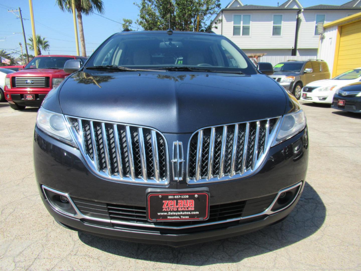 2015 Black /Tan Lincoln MKX FWD (2LMDJ6JK1FB) with an 3.7L V6 DOHC 24V engine, Automatic transmission, located at 1511 North Shepherd Dr., Houston, TX, 77008, (281) 657-1221, 29.798361, -95.412560 - 2015 Lincoln MKX FWD SUV 4-DR 3.7L V6 DOHC 24V V6 - Photo#26