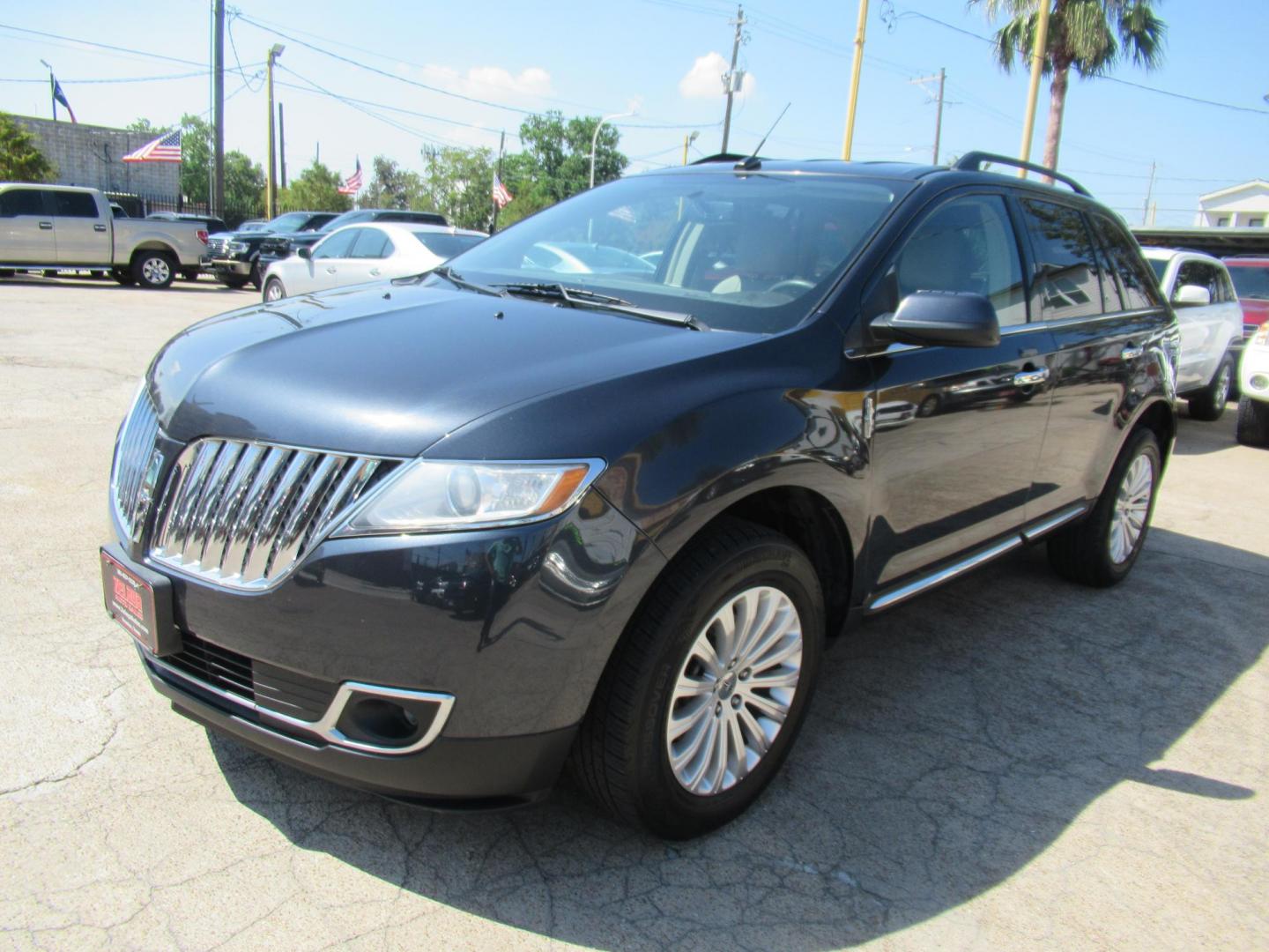 2015 Black /Tan Lincoln MKX FWD (2LMDJ6JK1FB) with an 3.7L V6 DOHC 24V engine, Automatic transmission, located at 1511 North Shepherd Dr., Houston, TX, 77008, (281) 657-1221, 29.798361, -95.412560 - 2015 Lincoln MKX FWD SUV 4-DR 3.7L V6 DOHC 24V V6 - Photo#27