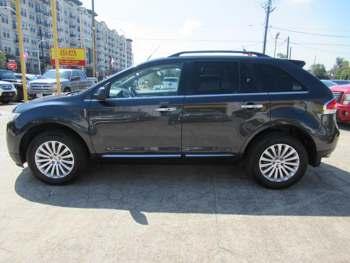 2015 Black /Tan Lincoln MKX FWD (2LMDJ6JK1FB) with an 3.7L V6 DOHC 24V engine, Automatic transmission, located at 1511 North Shepherd Dr., Houston, TX, 77008, (281) 657-1221, 29.798361, -95.412560 - 2015 Lincoln MKX FWD SUV 4-DR 3.7L V6 DOHC 24V V6 - Photo#28