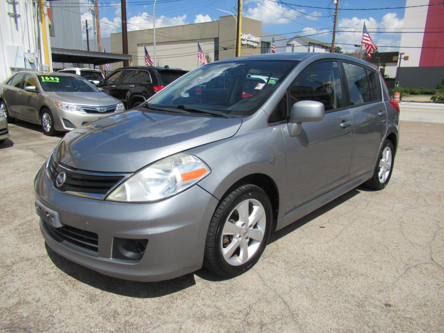 2012 Gray /Black Nissan Versa 1.8 SL Hatchback (3N1BC1CP5CK) with an 1.8L L4 DOHC 16V engine, Continuously Variable Transmission transmission, located at 1511 North Shepherd Dr., Houston, TX, 77008, (281) 657-1221, 29.798361, -95.412560 - 2012 Nissan Versa 1.8 SL Hatchback 1.8L L4 DOHC 16V 4 Cylinder - Photo#16