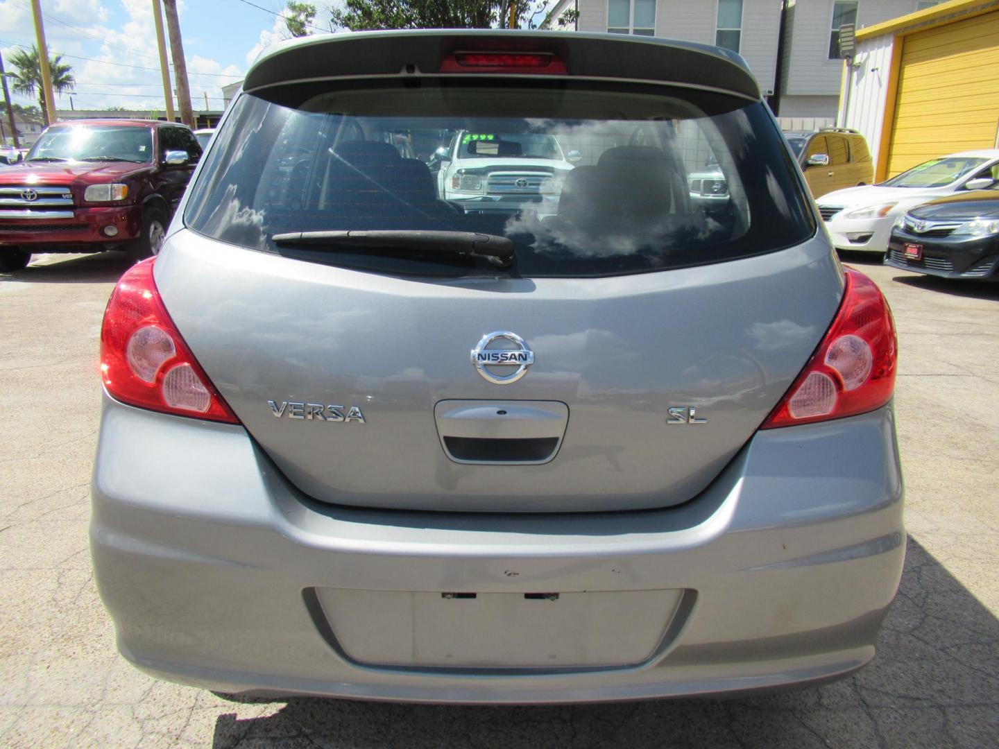 2012 Gray /Black Nissan Versa 1.8 SL Hatchback (3N1BC1CP5CK) with an 1.8L L4 DOHC 16V engine, Continuously Variable Transmission transmission, located at 1511 North Shepherd Dr., Houston, TX, 77008, (281) 657-1221, 29.798361, -95.412560 - 2012 Nissan Versa 1.8 SL Hatchback 1.8L L4 DOHC 16V 4 Cylinder - Photo#19