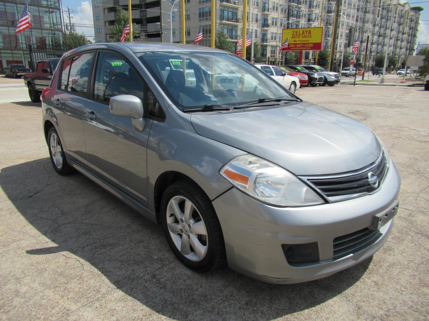 2012 Gray /Black Nissan Versa 1.8 SL Hatchback (3N1BC1CP5CK) with an 1.8L L4 DOHC 16V engine, Continuously Variable Transmission transmission, located at 1511 North Shepherd Dr., Houston, TX, 77008, (281) 657-1221, 29.798361, -95.412560 - 2012 Nissan Versa 1.8 SL Hatchback 1.8L L4 DOHC 16V 4 Cylinder - Photo#22