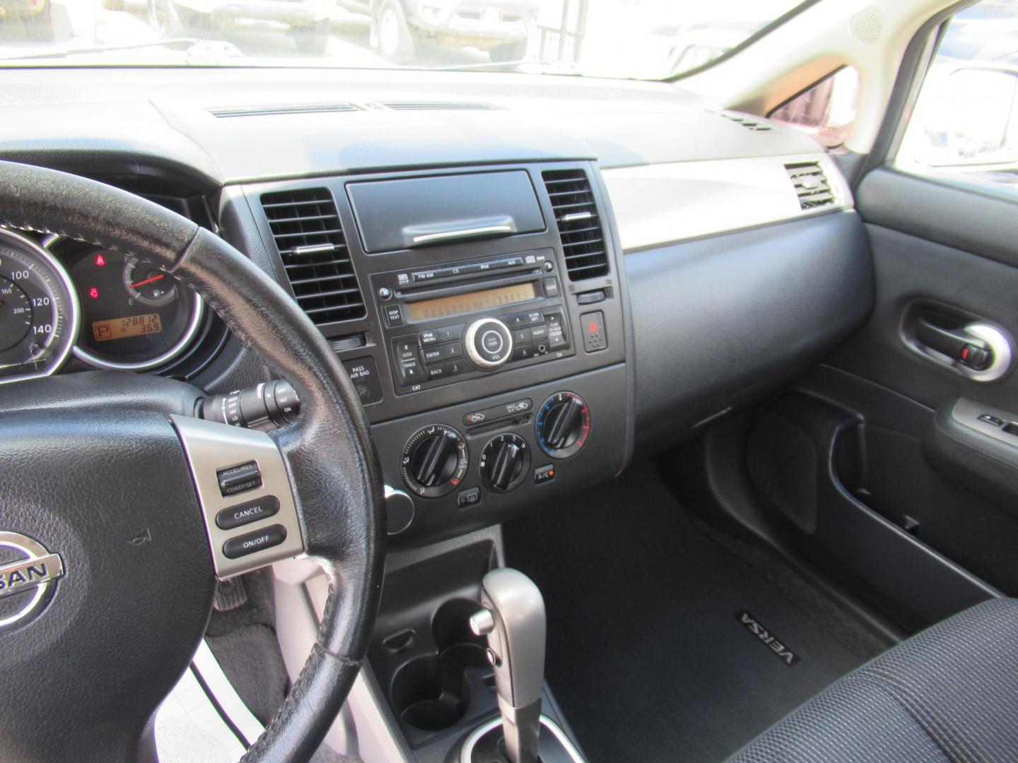 2012 Gray /Black Nissan Versa 1.8 SL Hatchback (3N1BC1CP5CK) with an 1.8L L4 DOHC 16V engine, Continuously Variable Transmission transmission, located at 1511 North Shepherd Dr., Houston, TX, 77008, (281) 657-1221, 29.798361, -95.412560 - 2012 Nissan Versa 1.8 SL Hatchback 1.8L L4 DOHC 16V 4 Cylinder - Photo#4