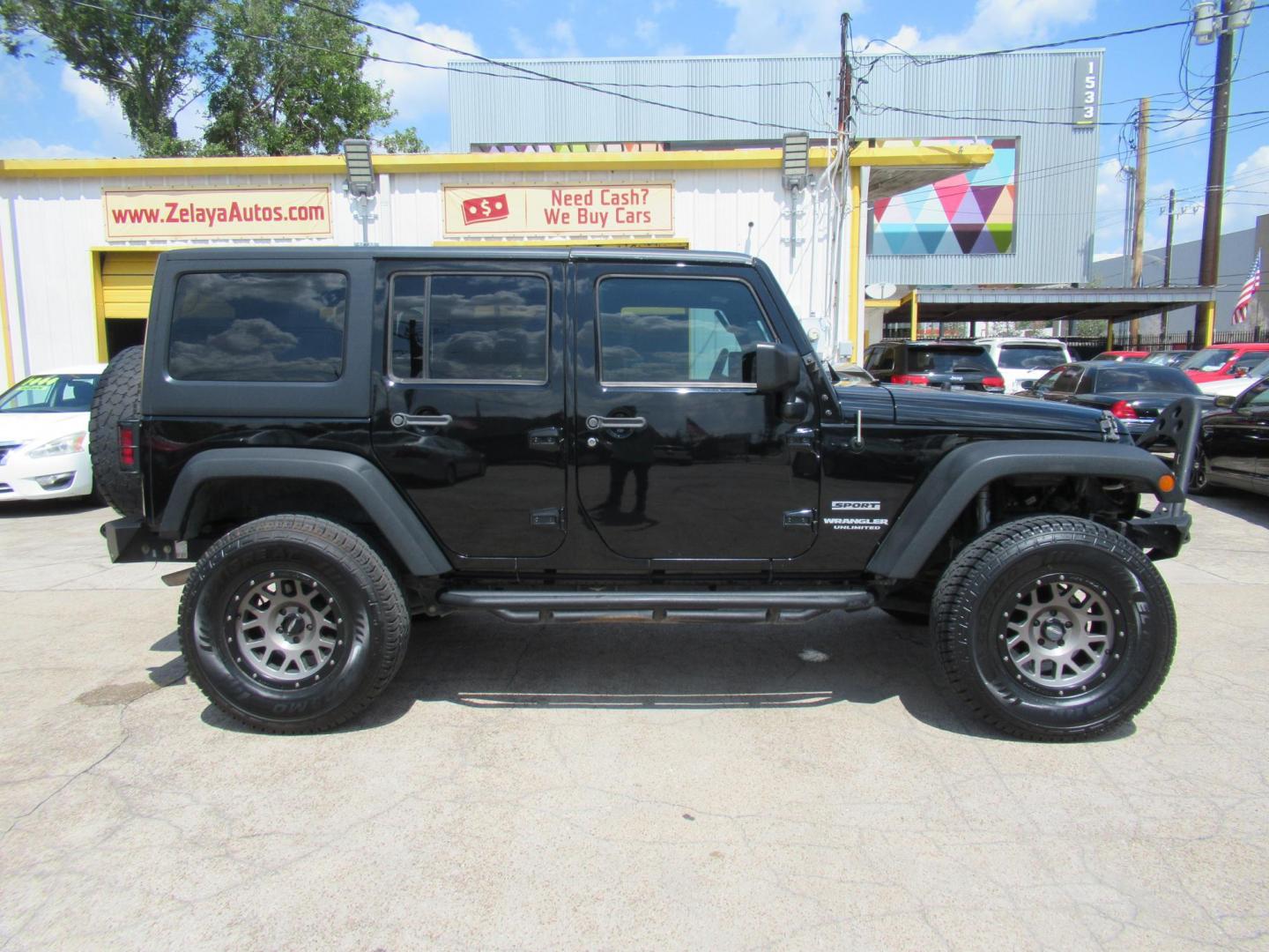 2016 Black /Black Jeep Wrangler Unlimited Sport 4WD (1C4BJWDG5GL) with an 3.6L V6 DOHC 24V FFV engine, located at 1511 North Shepherd Dr., Houston, TX, 77008, (281) 657-1221, 29.798361, -95.412560 - 2016 Jeep Wrangler Unlimited Sport 4WD 3.6L V6 DOHC 24V FFV V6 Automatic - Photo#0