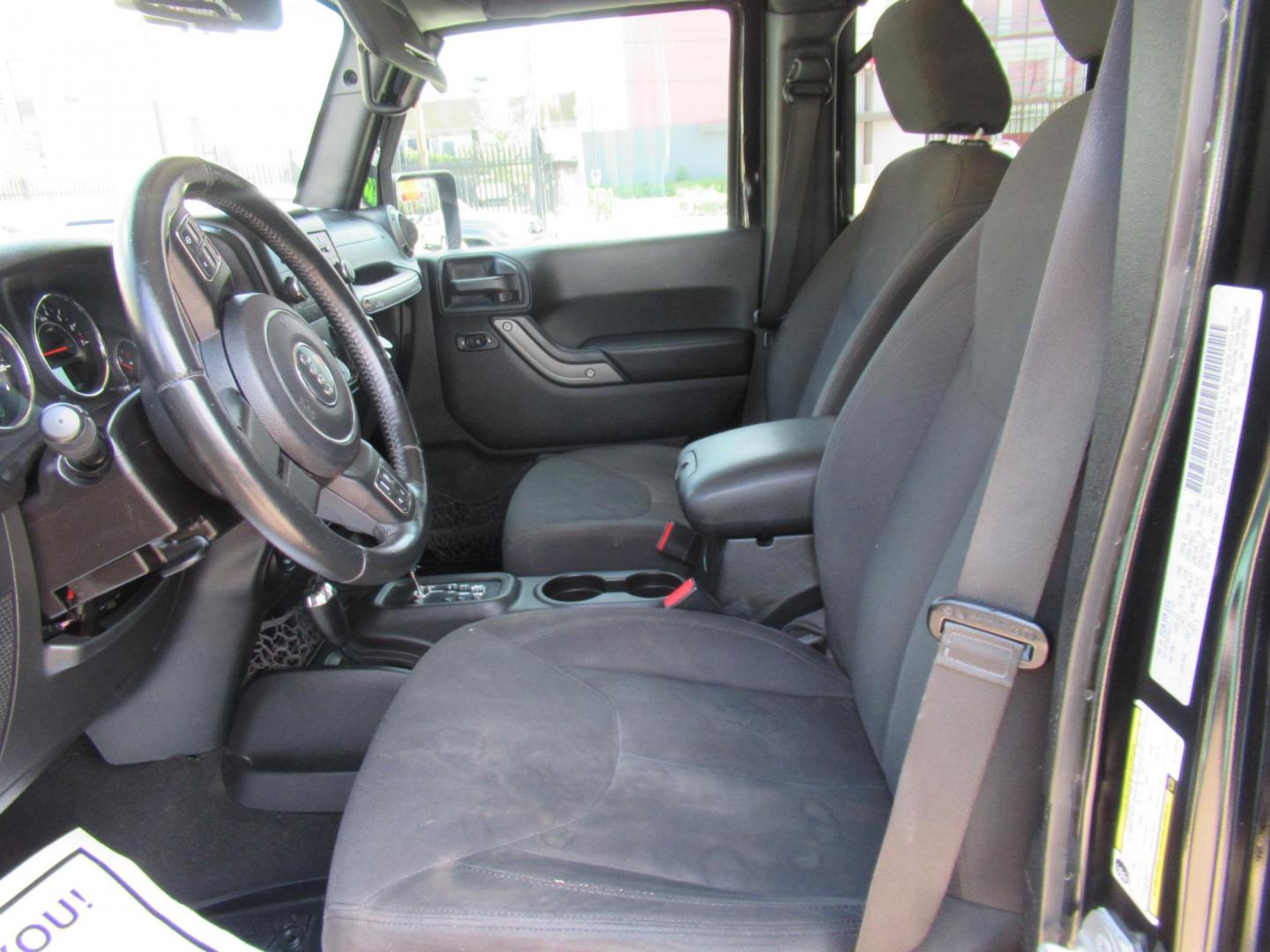 2016 Black /Black Jeep Wrangler Unlimited Sport 4WD (1C4BJWDG5GL) with an 3.6L V6 DOHC 24V FFV engine, located at 1511 North Shepherd Dr., Houston, TX, 77008, (281) 657-1221, 29.798361, -95.412560 - 2016 Jeep Wrangler Unlimited Sport 4WD 3.6L V6 DOHC 24V FFV V6 Automatic - Photo#2