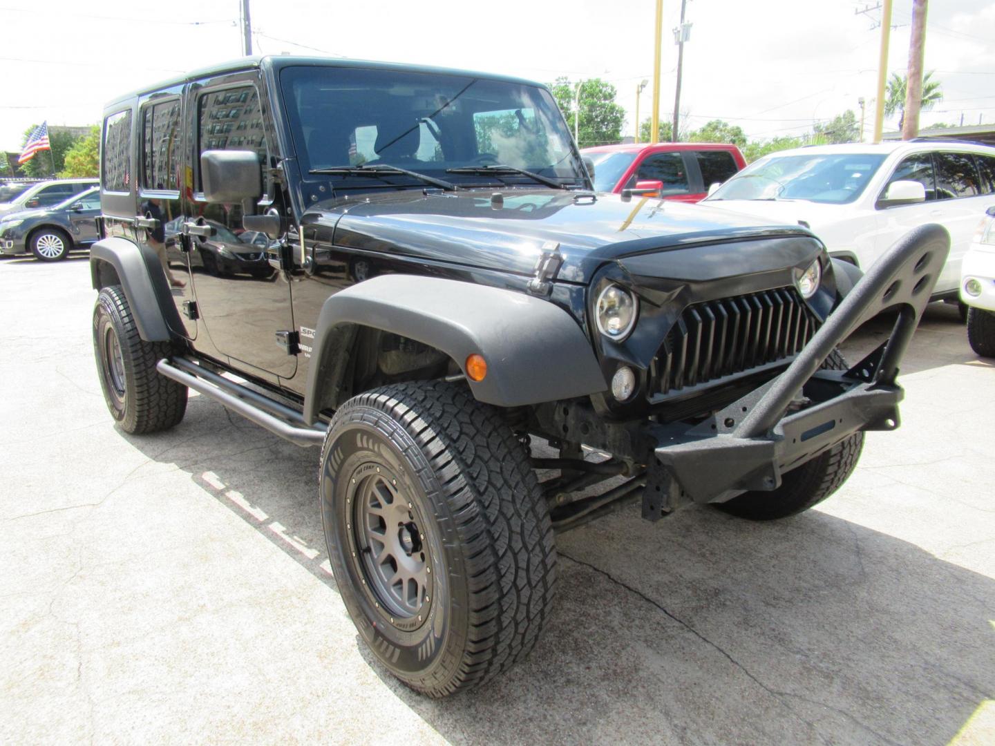 2016 Black /Black Jeep Wrangler Unlimited Sport 4WD (1C4BJWDG5GL) with an 3.6L V6 DOHC 24V FFV engine, located at 1511 North Shepherd Dr., Houston, TX, 77008, (281) 657-1221, 29.798361, -95.412560 - 2016 Jeep Wrangler Unlimited Sport 4WD 3.6L V6 DOHC 24V FFV V6 Automatic - Photo#25