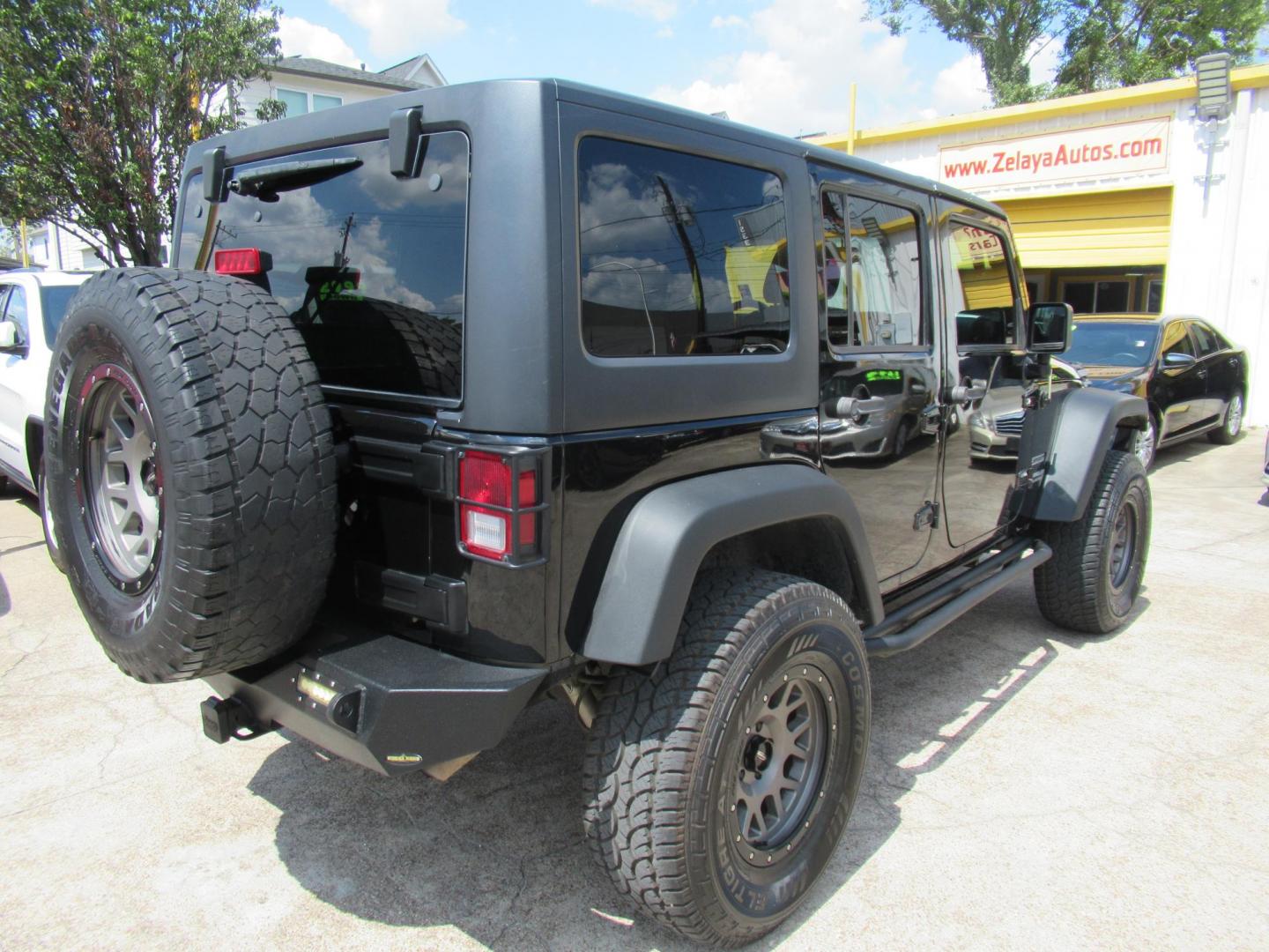 2016 Black /Black Jeep Wrangler Unlimited Sport 4WD (1C4BJWDG5GL) with an 3.6L V6 DOHC 24V FFV engine, located at 1511 North Shepherd Dr., Houston, TX, 77008, (281) 657-1221, 29.798361, -95.412560 - 2016 Jeep Wrangler Unlimited Sport 4WD 3.6L V6 DOHC 24V FFV V6 Automatic - Photo#26