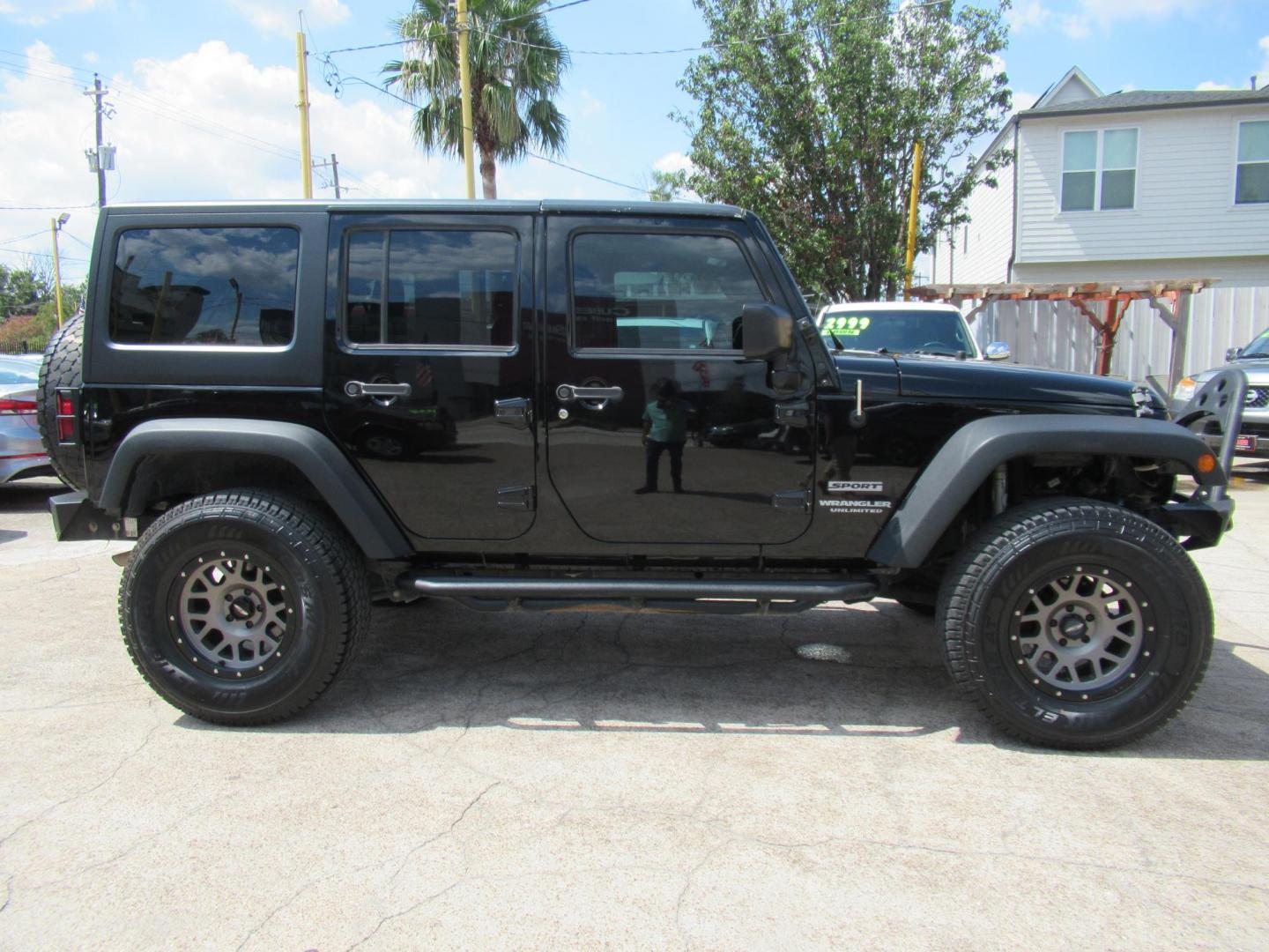 2016 Black /Black Jeep Wrangler Unlimited Sport 4WD (1C4BJWDG5GL) with an 3.6L V6 DOHC 24V FFV engine, located at 1511 North Shepherd Dr., Houston, TX, 77008, (281) 657-1221, 29.798361, -95.412560 - 2016 Jeep Wrangler Unlimited Sport 4WD 3.6L V6 DOHC 24V FFV V6 Automatic - Photo#27