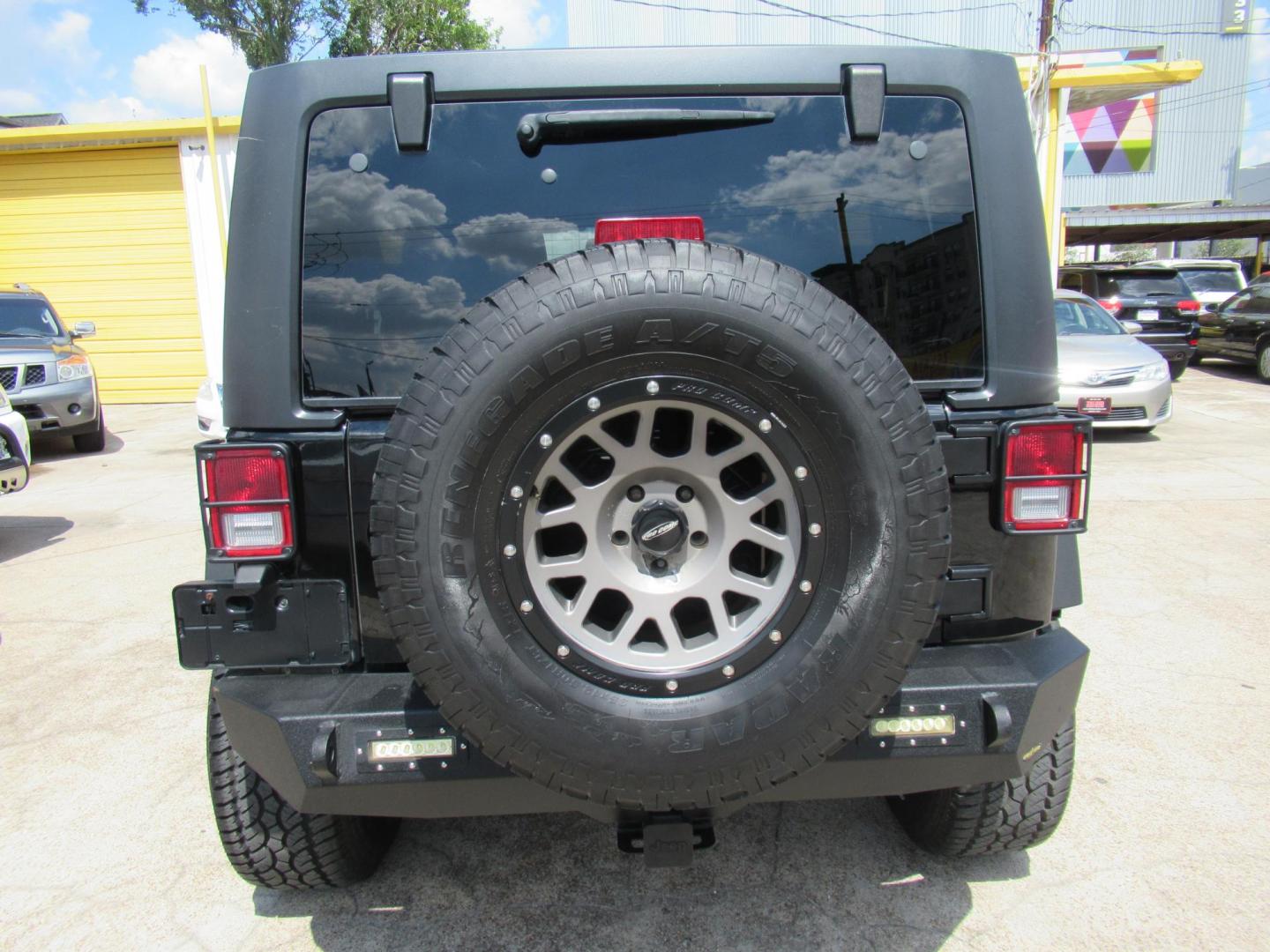 2016 Black /Black Jeep Wrangler Unlimited Sport 4WD (1C4BJWDG5GL) with an 3.6L V6 DOHC 24V FFV engine, located at 1511 North Shepherd Dr., Houston, TX, 77008, (281) 657-1221, 29.798361, -95.412560 - 2016 Jeep Wrangler Unlimited Sport 4WD 3.6L V6 DOHC 24V FFV V6 Automatic - Photo#28