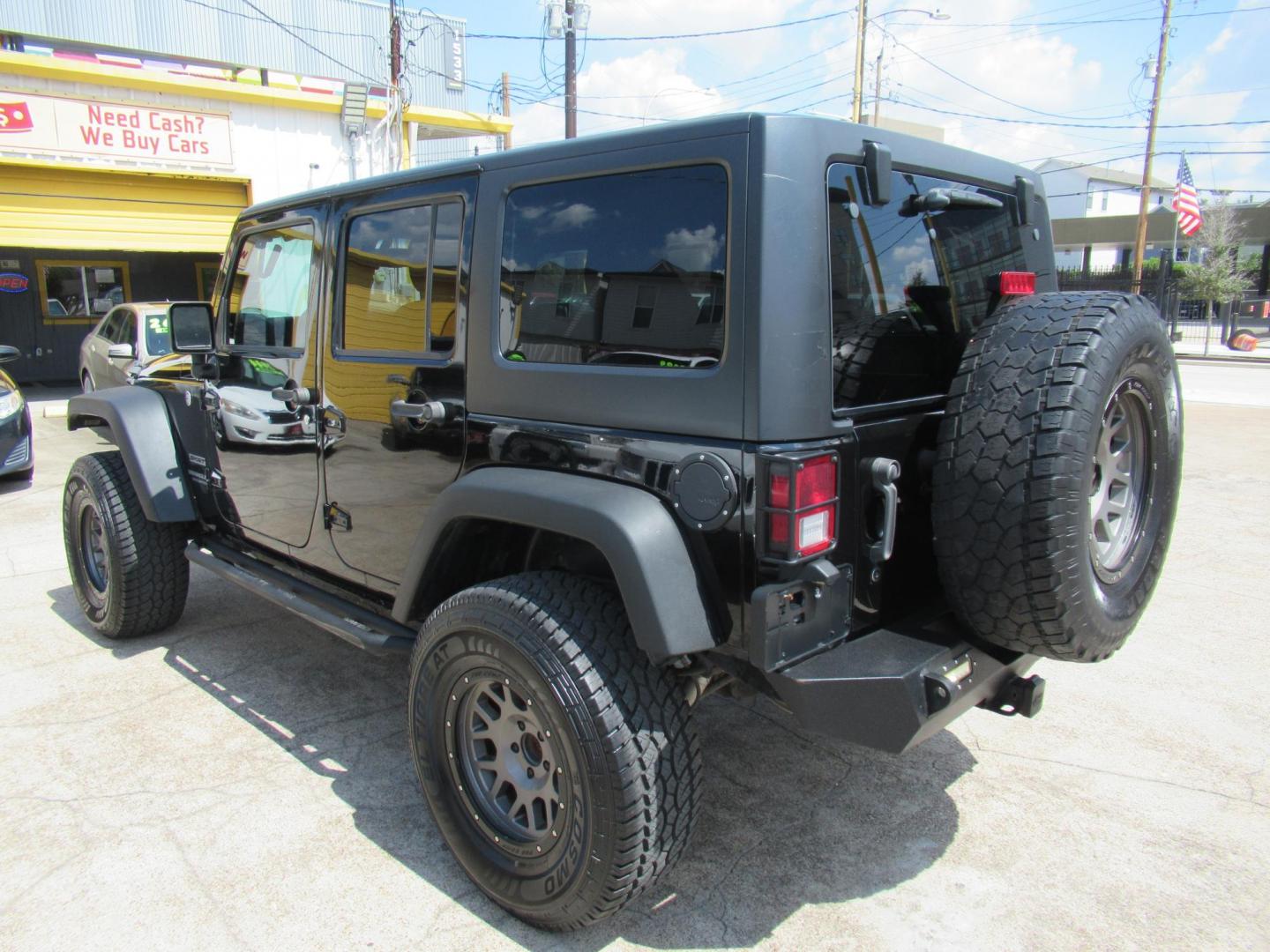 2016 Black /Black Jeep Wrangler Unlimited Sport 4WD (1C4BJWDG5GL) with an 3.6L V6 DOHC 24V FFV engine, located at 1511 North Shepherd Dr., Houston, TX, 77008, (281) 657-1221, 29.798361, -95.412560 - 2016 Jeep Wrangler Unlimited Sport 4WD 3.6L V6 DOHC 24V FFV V6 Automatic - Photo#29