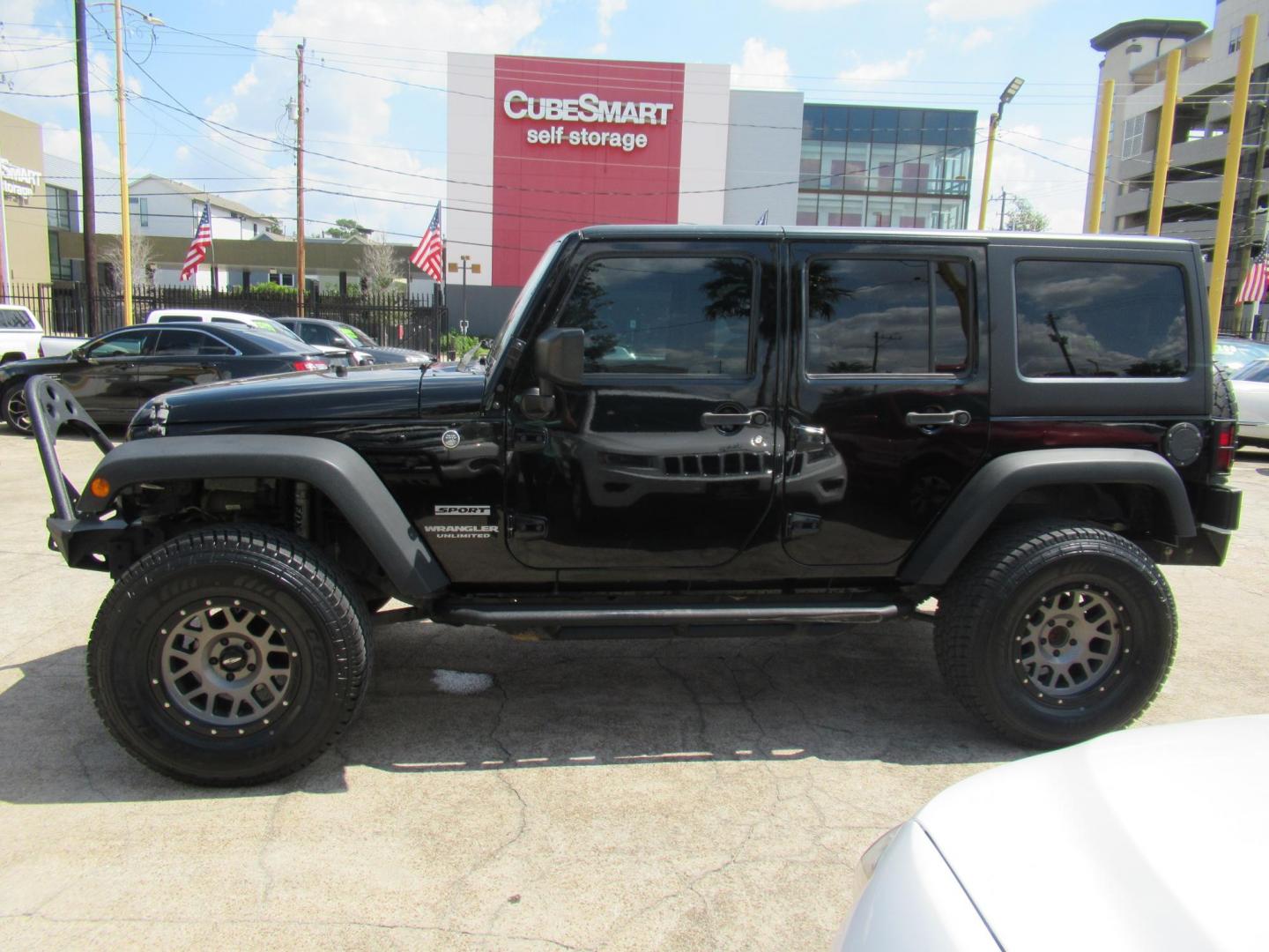 2016 Black /Black Jeep Wrangler Unlimited Sport 4WD (1C4BJWDG5GL) with an 3.6L V6 DOHC 24V FFV engine, located at 1511 North Shepherd Dr., Houston, TX, 77008, (281) 657-1221, 29.798361, -95.412560 - 2016 Jeep Wrangler Unlimited Sport 4WD 3.6L V6 DOHC 24V FFV V6 Automatic - Photo#30