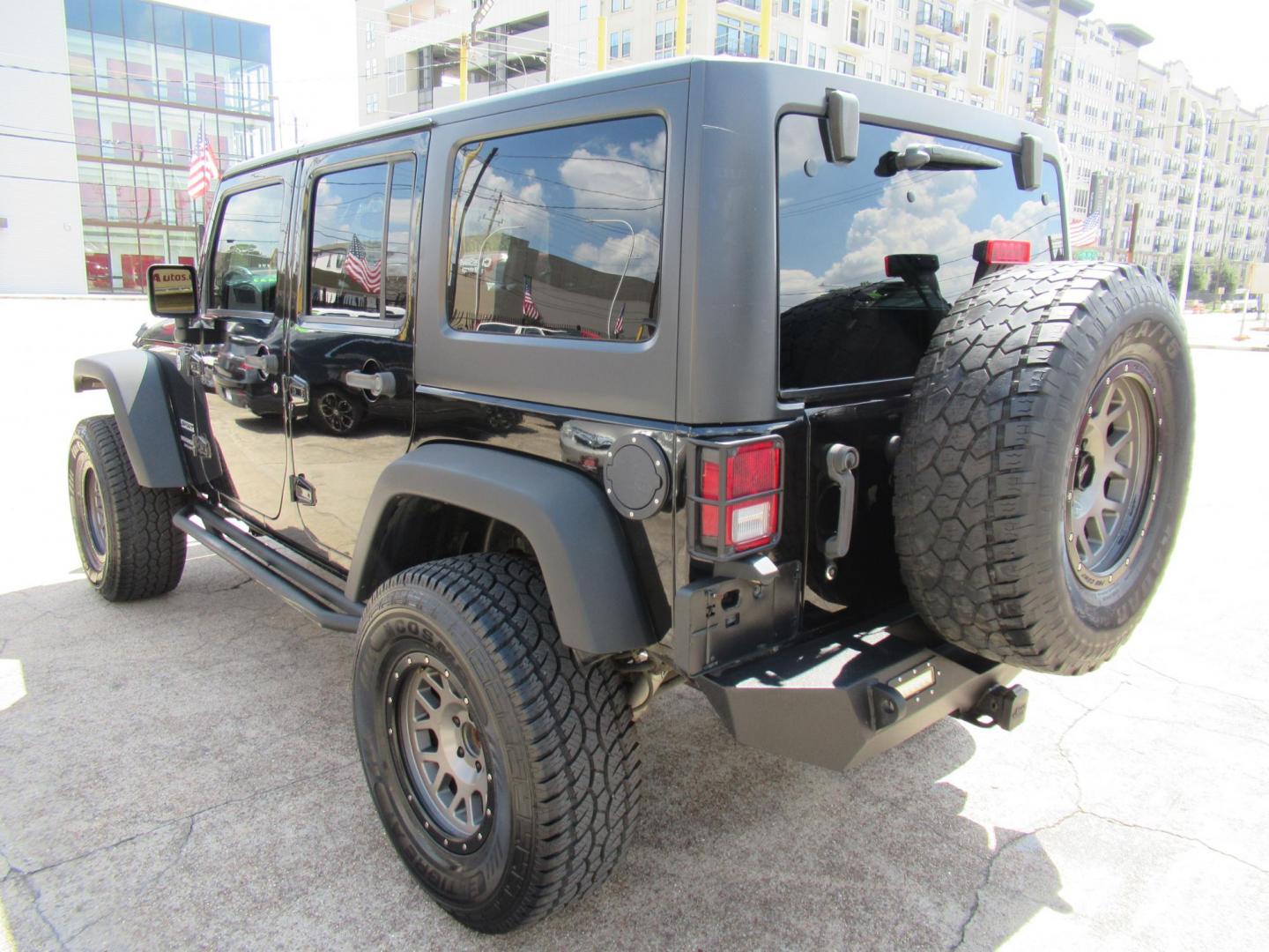 2016 Black /Black Jeep Wrangler Unlimited Sport 4WD (1C4BJWDG5GL) with an 3.6L V6 DOHC 24V FFV engine, located at 1511 North Shepherd Dr., Houston, TX, 77008, (281) 657-1221, 29.798361, -95.412560 - 2016 Jeep Wrangler Unlimited Sport 4WD 3.6L V6 DOHC 24V FFV V6 Automatic - Photo#31