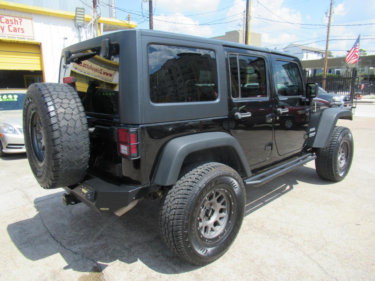 2016 Black /Black Jeep Wrangler Unlimited Sport 4WD (1C4BJWDG5GL) with an 3.6L V6 DOHC 24V FFV engine, located at 1511 North Shepherd Dr., Houston, TX, 77008, (281) 657-1221, 29.798361, -95.412560 - 2016 Jeep Wrangler Unlimited Sport 4WD 3.6L V6 DOHC 24V FFV V6 Automatic - Photo#32