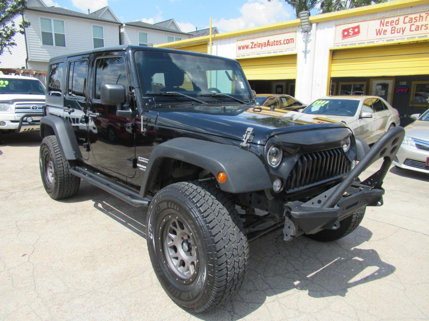 2016 Black /Black Jeep Wrangler Unlimited Sport 4WD (1C4BJWDG5GL) with an 3.6L V6 DOHC 24V FFV engine, located at 1511 North Shepherd Dr., Houston, TX, 77008, (281) 657-1221, 29.798361, -95.412560 - 2016 Jeep Wrangler Unlimited Sport 4WD 3.6L V6 DOHC 24V FFV V6 Automatic - Photo#33