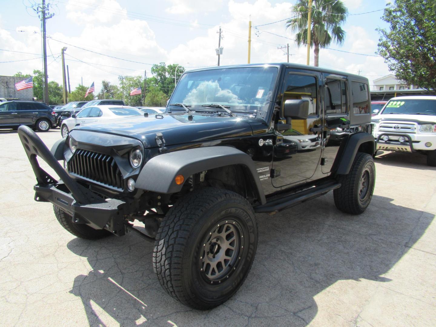 2016 Black /Black Jeep Wrangler Unlimited Sport 4WD (1C4BJWDG5GL) with an 3.6L V6 DOHC 24V FFV engine, located at 1511 North Shepherd Dr., Houston, TX, 77008, (281) 657-1221, 29.798361, -95.412560 - 2016 Jeep Wrangler Unlimited Sport 4WD 3.6L V6 DOHC 24V FFV V6 Automatic - Photo#35