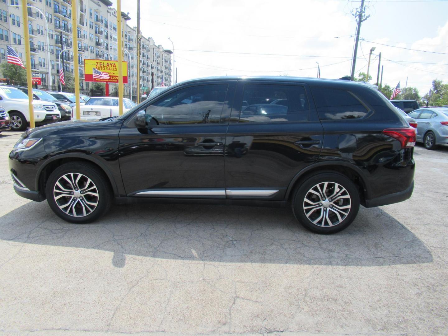 2018 Black /Black Mitsubishi Outlander ES 2WD (JA4AD2A33JZ) with an 2.4L L4 DOHC 16V engine, CVT transmission, located at 1511 North Shepherd Dr., Houston, TX, 77008, (281) 657-1221, 29.798361, -95.412560 - 2018 Mitsubishi Outlander ES 2WDES 2WDES 2WDES 2WD SUV 4-DR 2.4L L4 DOHC 16V - Photo#0