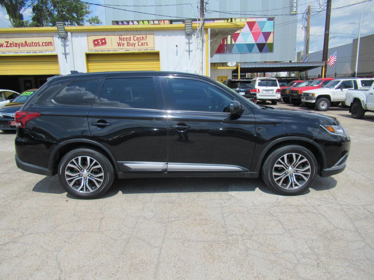 2018 Black /Black Mitsubishi Outlander ES 2WD (JA4AD2A33JZ) with an 2.4L L4 DOHC 16V engine, CVT transmission, located at 1511 North Shepherd Dr., Houston, TX, 77008, (281) 657-1221, 29.798361, -95.412560 - 2018 Mitsubishi Outlander ES 2WDES 2WDES 2WDES 2WD SUV 4-DR 2.4L L4 DOHC 16V - Photo#18